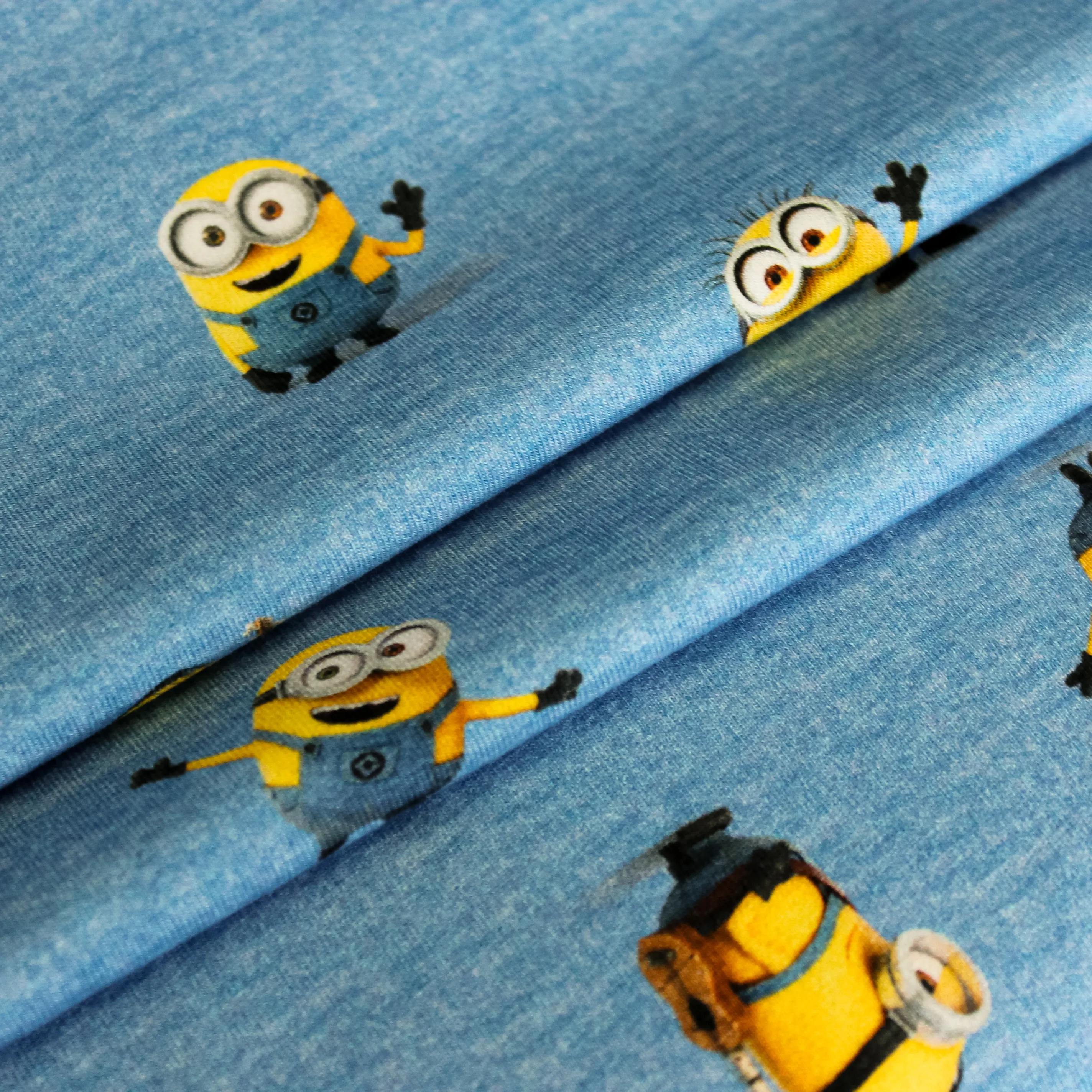 Blauwe gemêleerde katoentricot met Minions