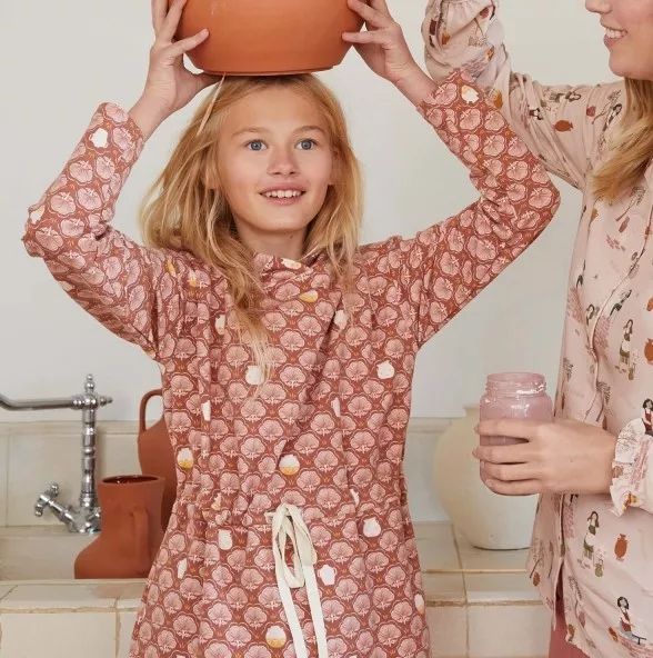 Sweaterstof bruin met bloemen en potten  - Katia -