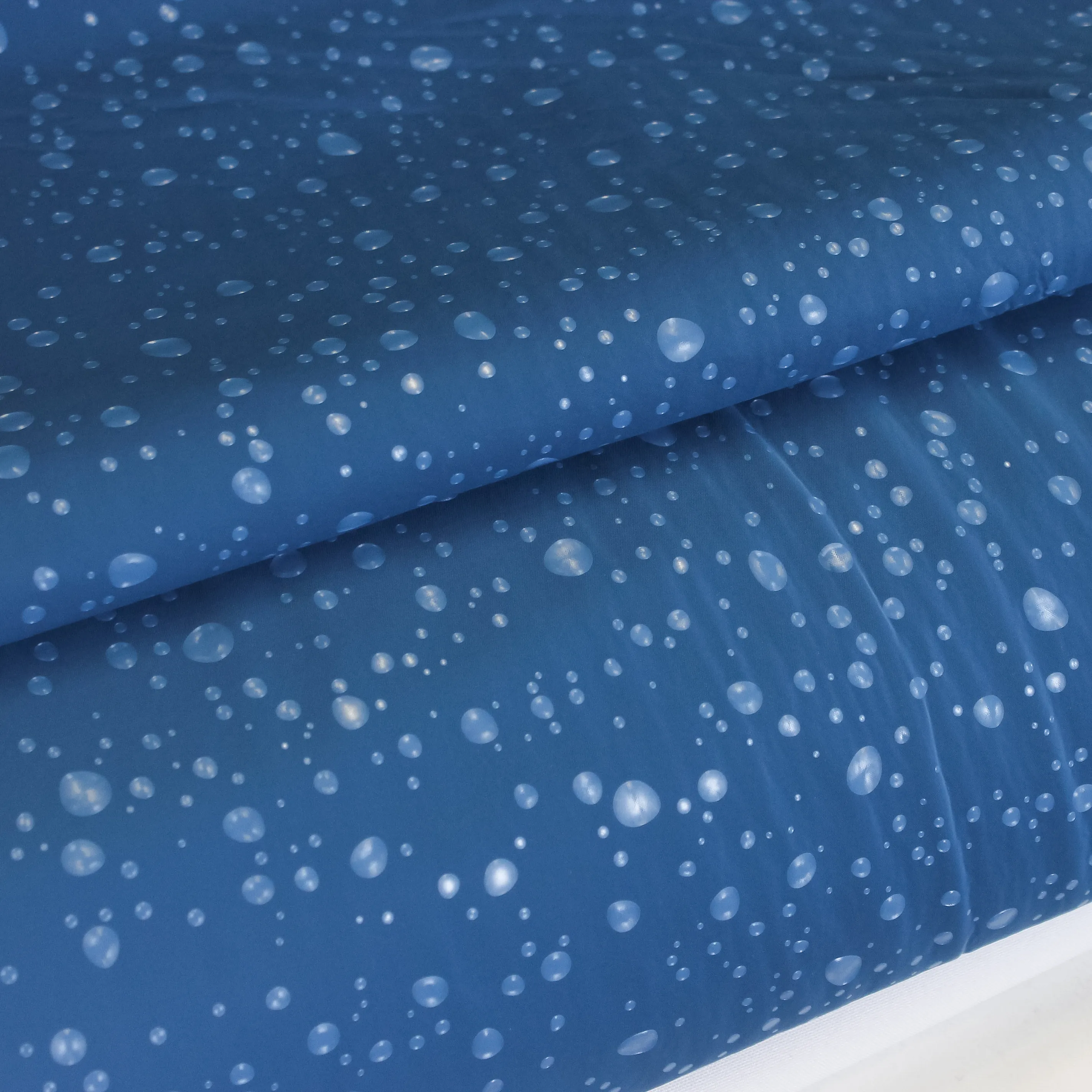 Softshell indigo blauw met bubbels en zachte achterkant
