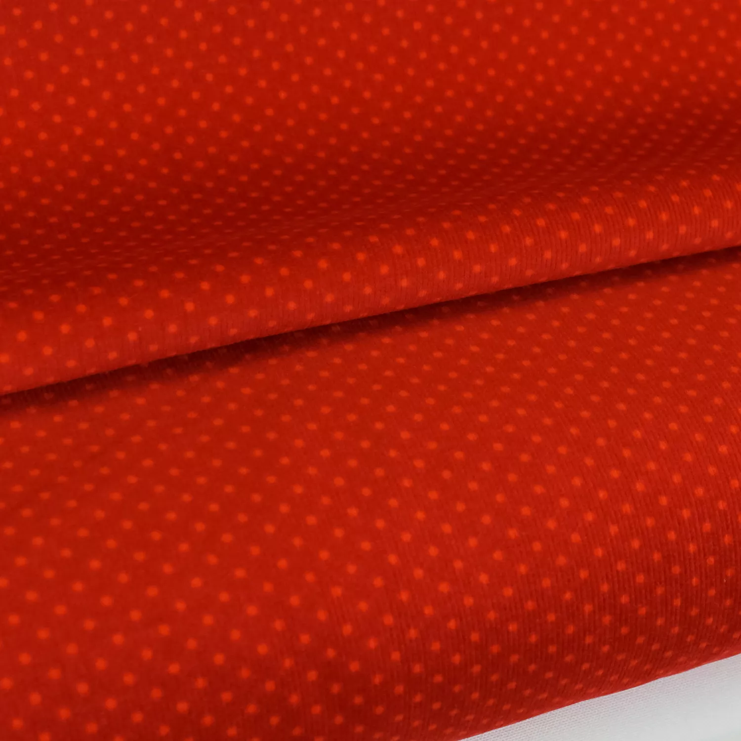 Ribfluweel rood met stippen