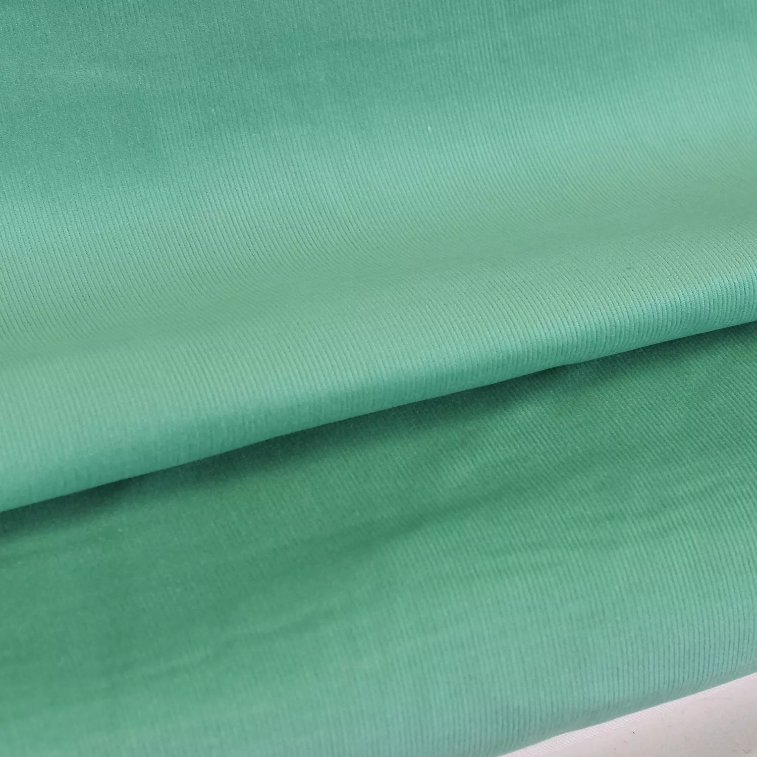 Ribfluweel uni turquoise