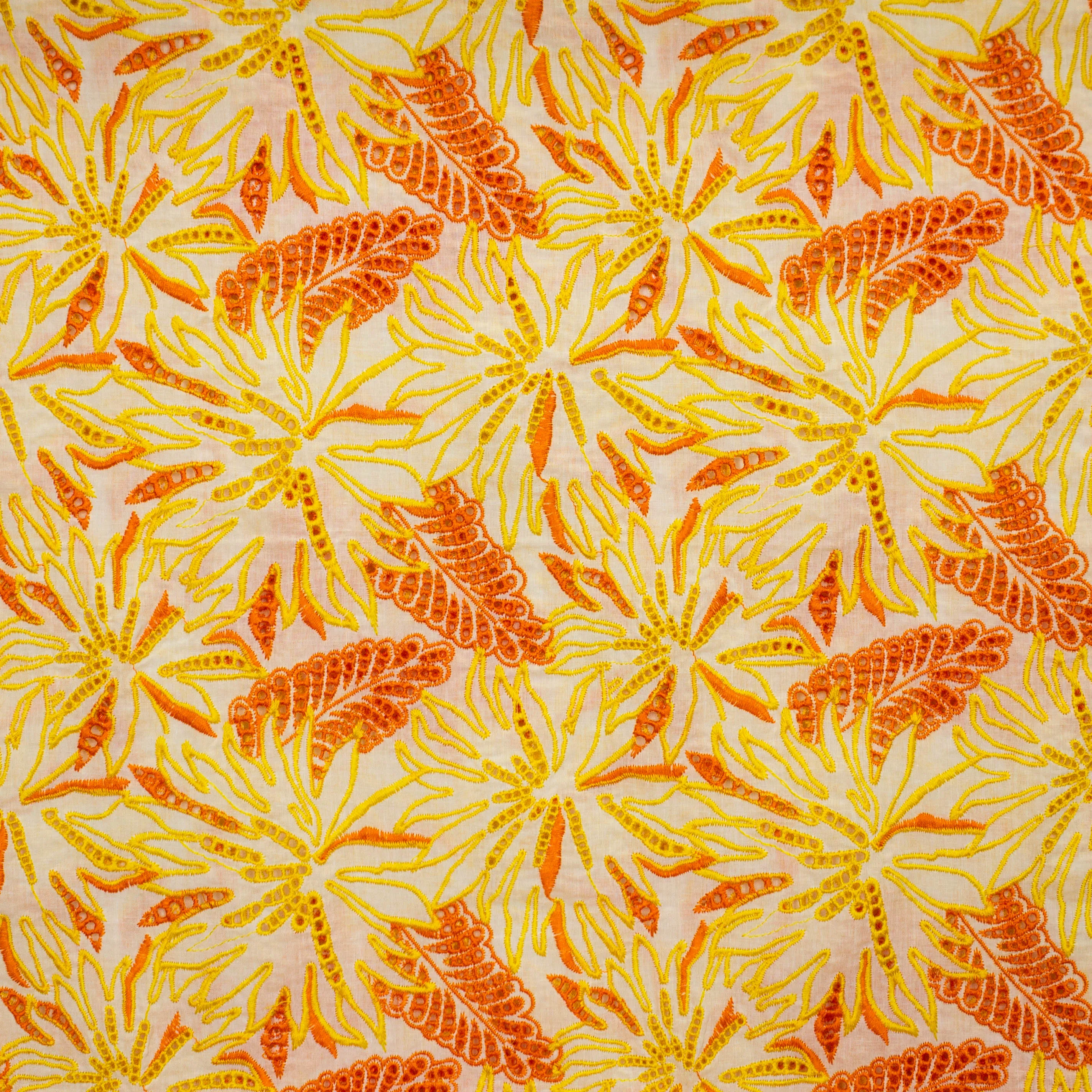 Broderie katoen geel / oranje met bloemen