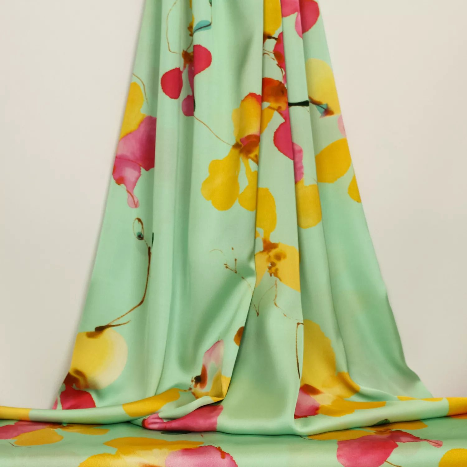 Polyester satijn turquoise met geel/fuchsia bloemen