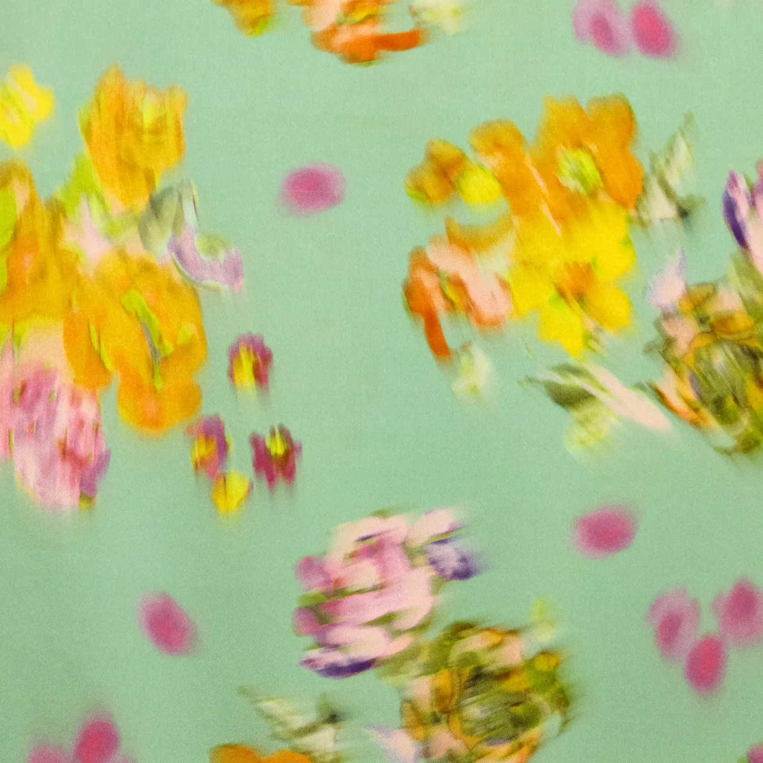 Polyester turquoise met vaag gekleurde bloemen