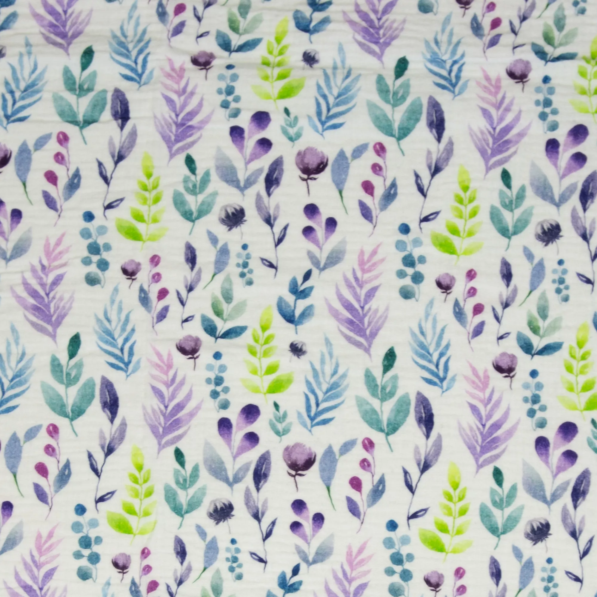 Double gauze wit met bladeren en bloemen