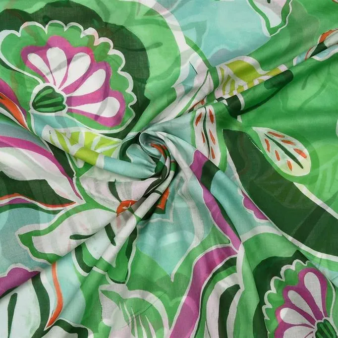Katoen doorschijnend met groene print - Knipmode
