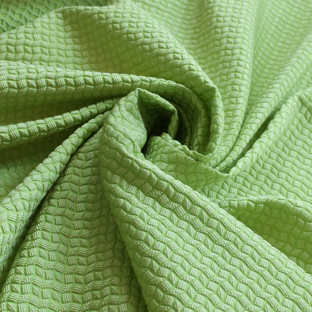 Jacquard met geometrisch reliëf groen - Lorré
