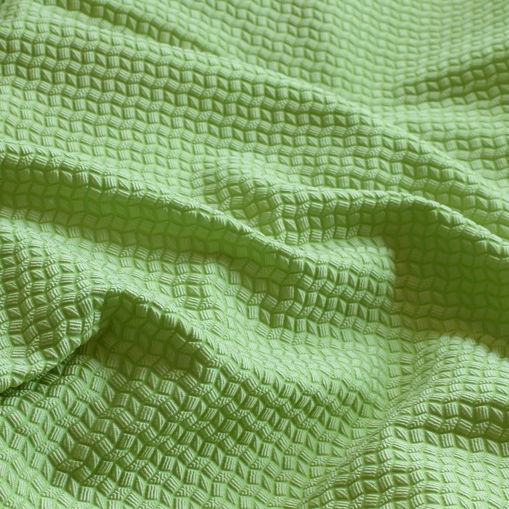 Jacquard met geometrisch reliëf groen - Lorré