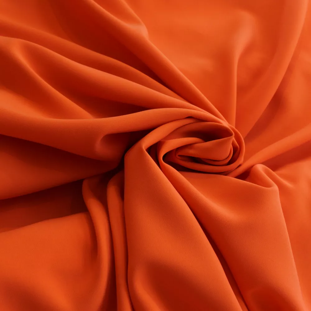 Stretch crêpe oranje - Lorré