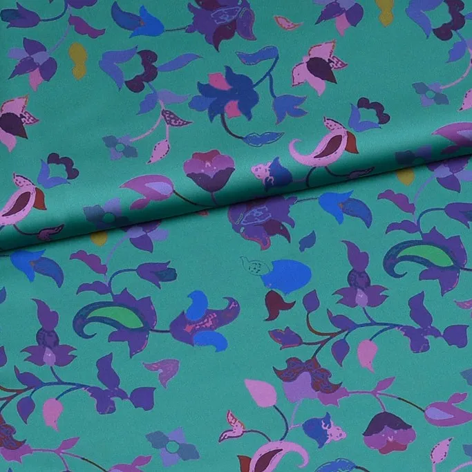 Gesatineerde polyester turquoise met bloemen