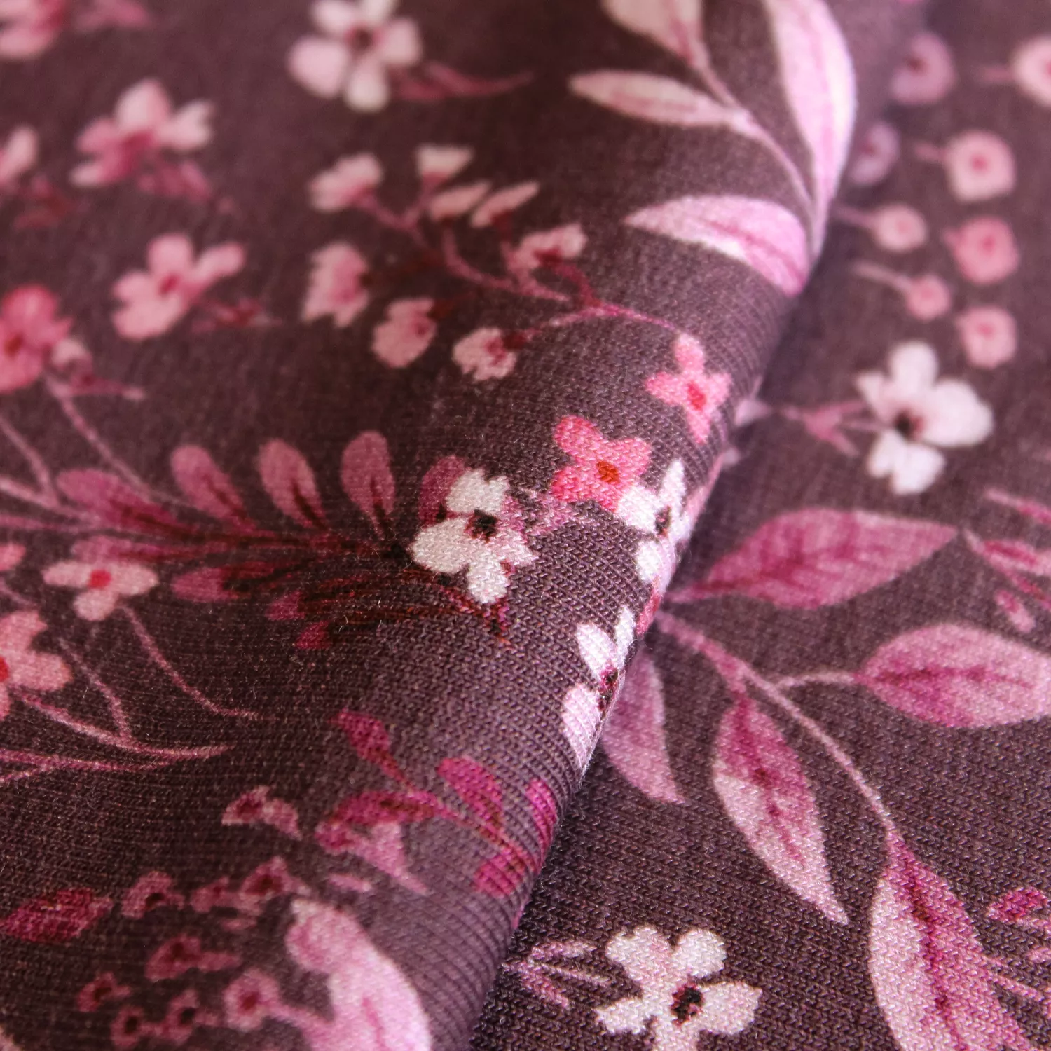French Terry mauve met roze bloemen