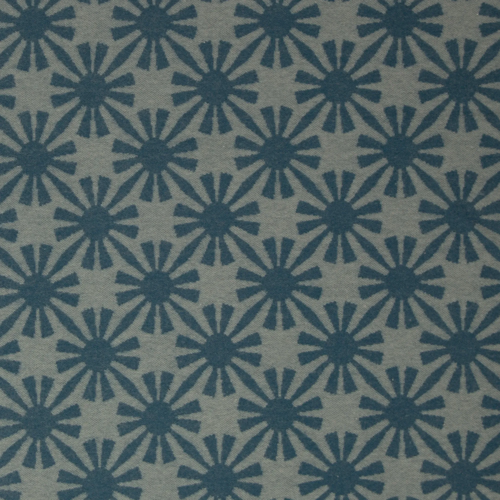 Jacquard tricot blauw met zonnen motief