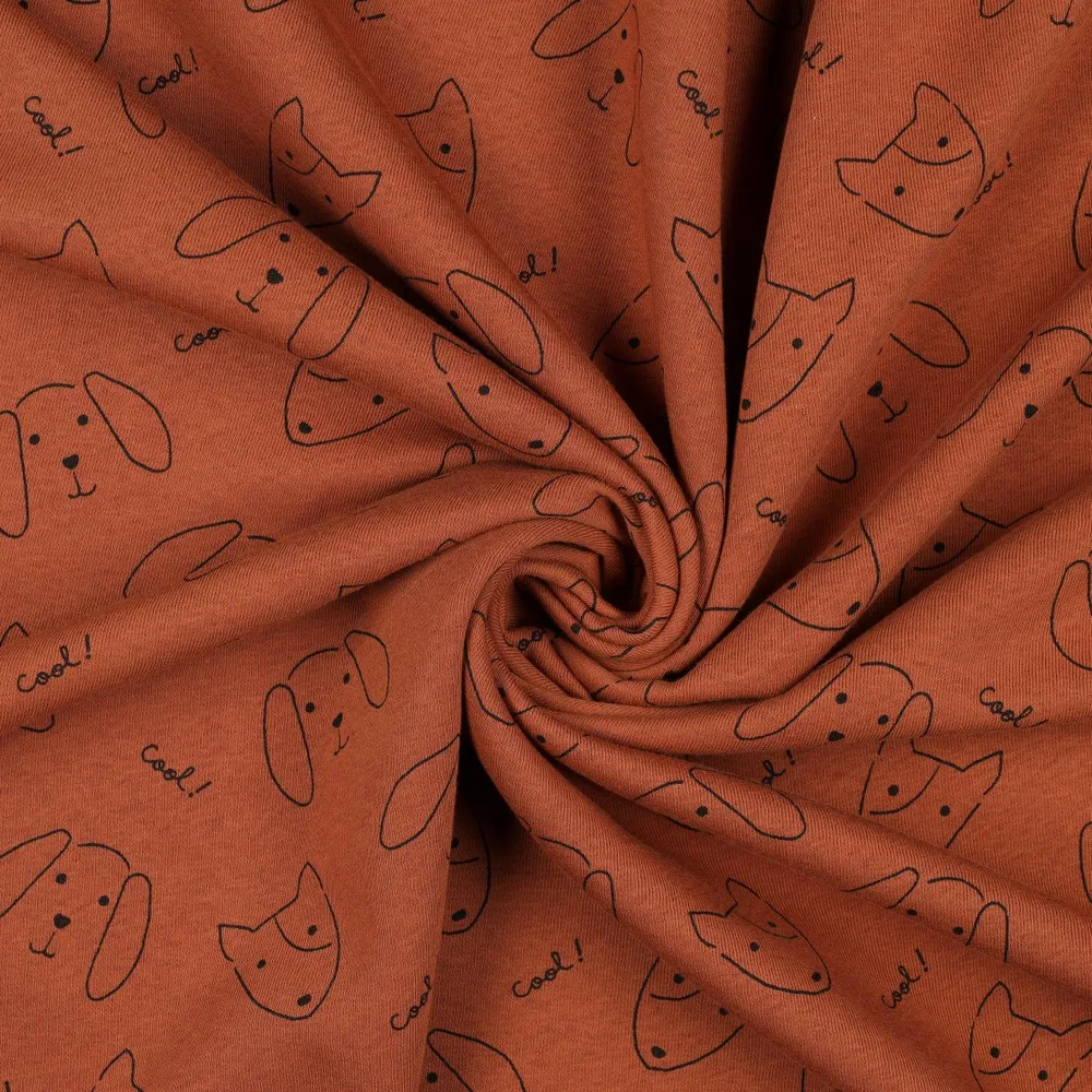 Sweaterstof terracotta met honden - Poppy