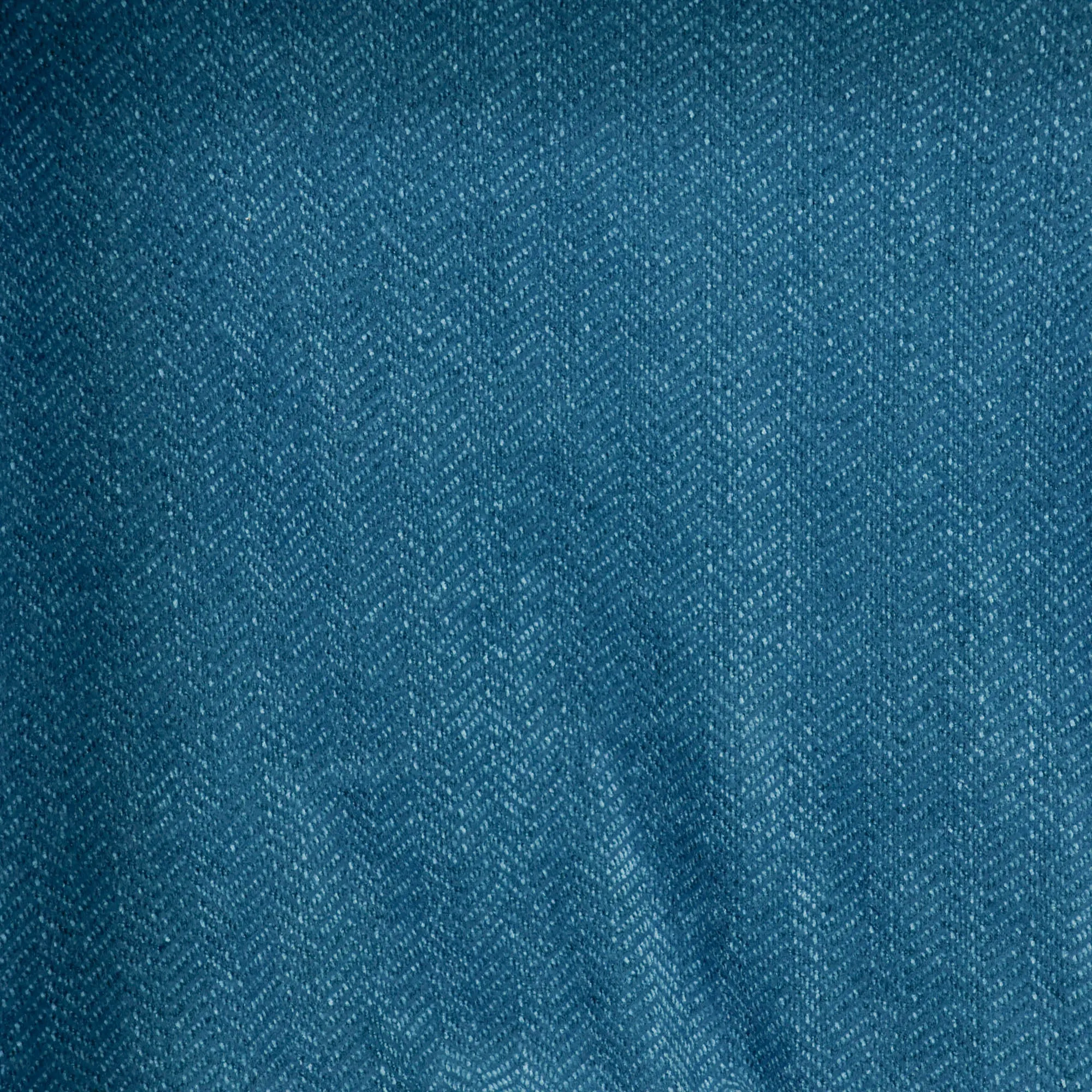 Bouclé turquoise met visgraatpatroon