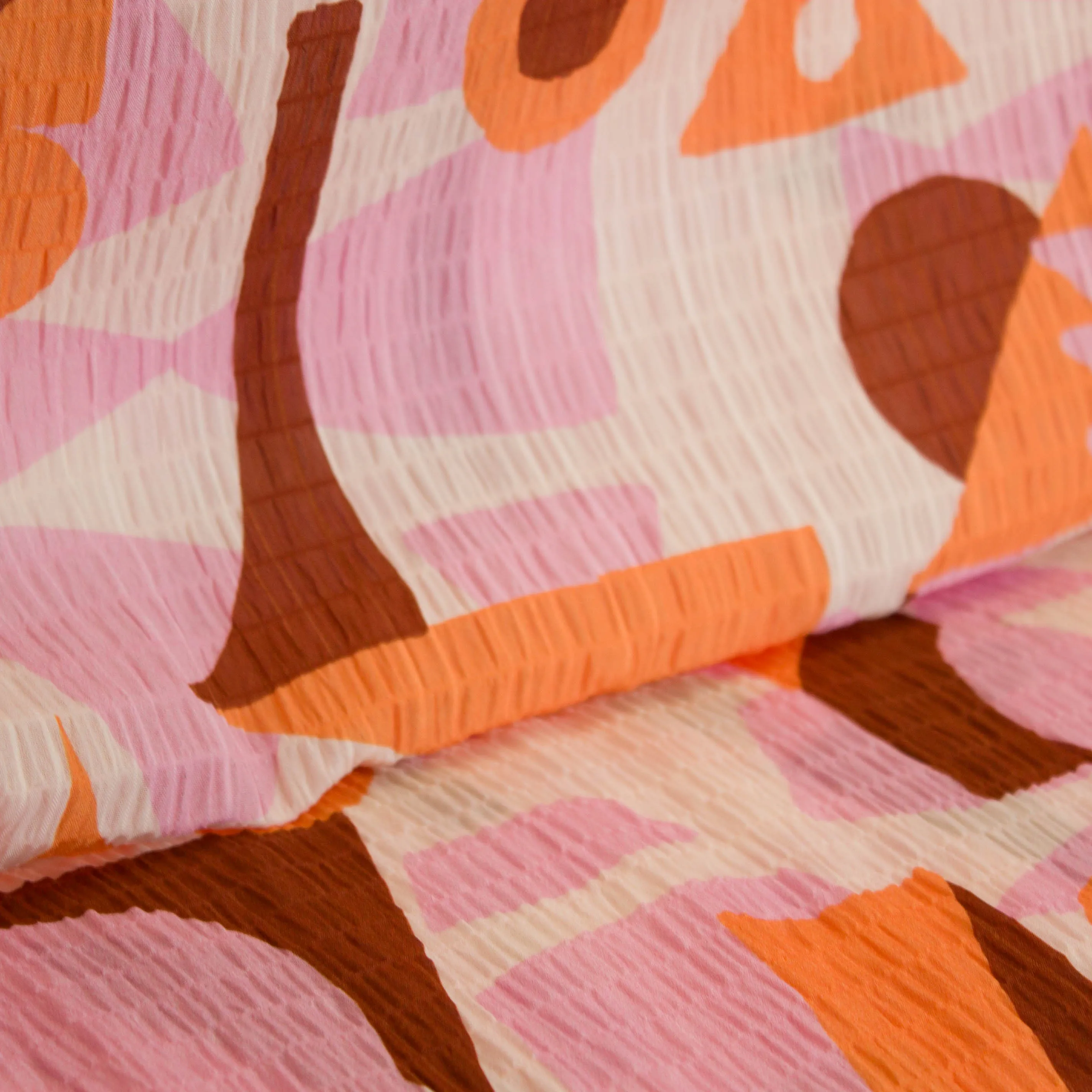 Polyester seersucker met abstracte print - Knipmode & Editex
