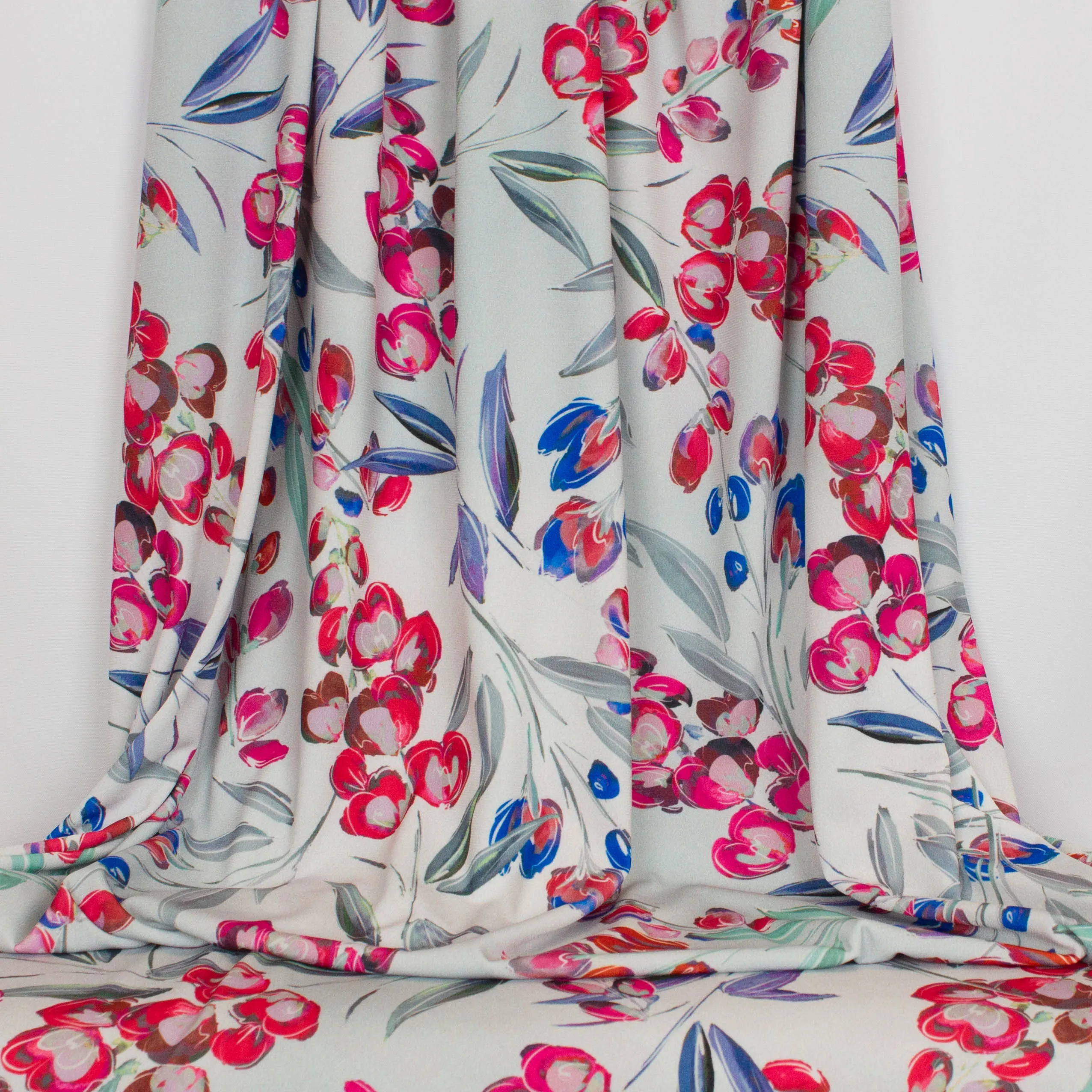 Viscose polyester tricot grijs met bloemen