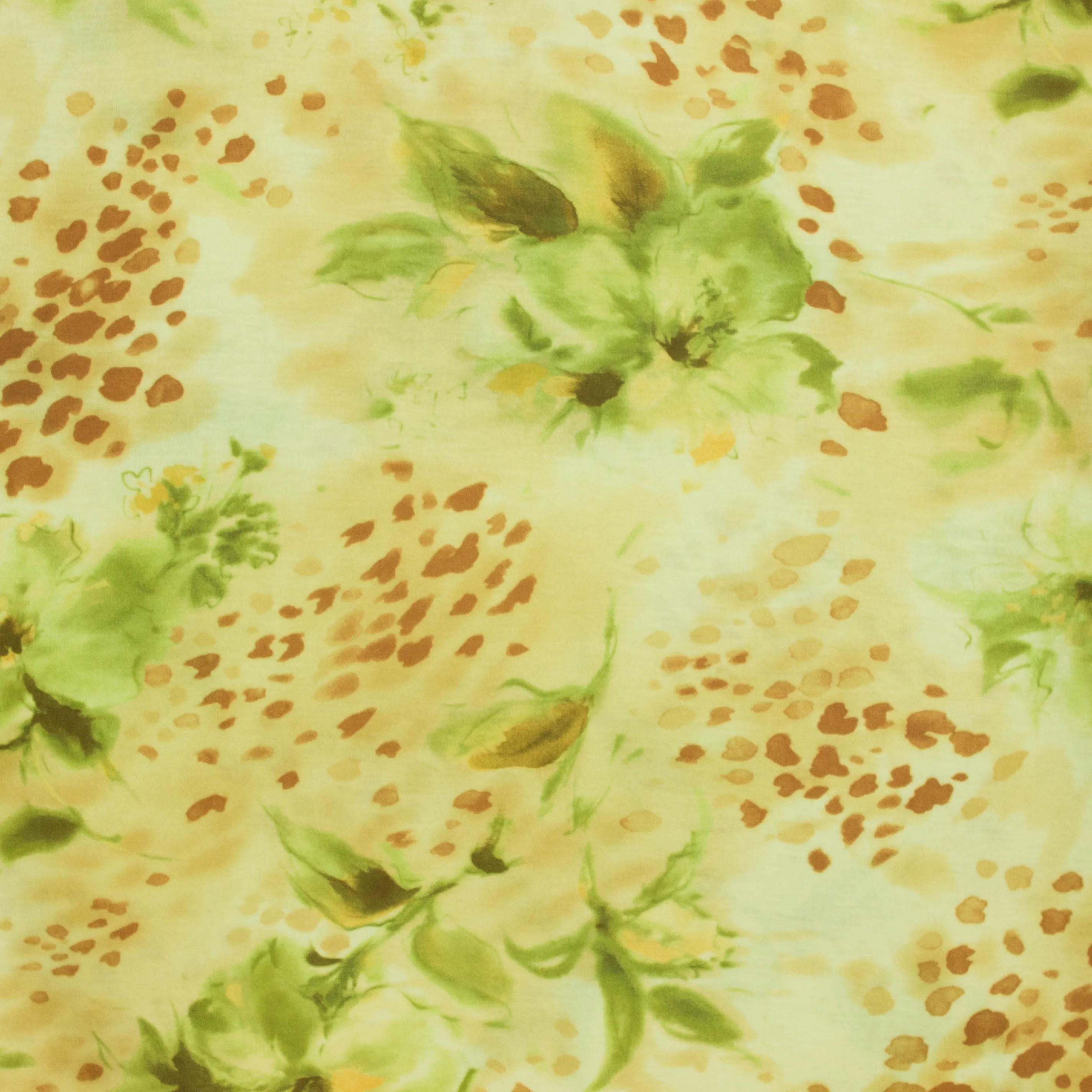 Katoen tricot geel met groene bloemen