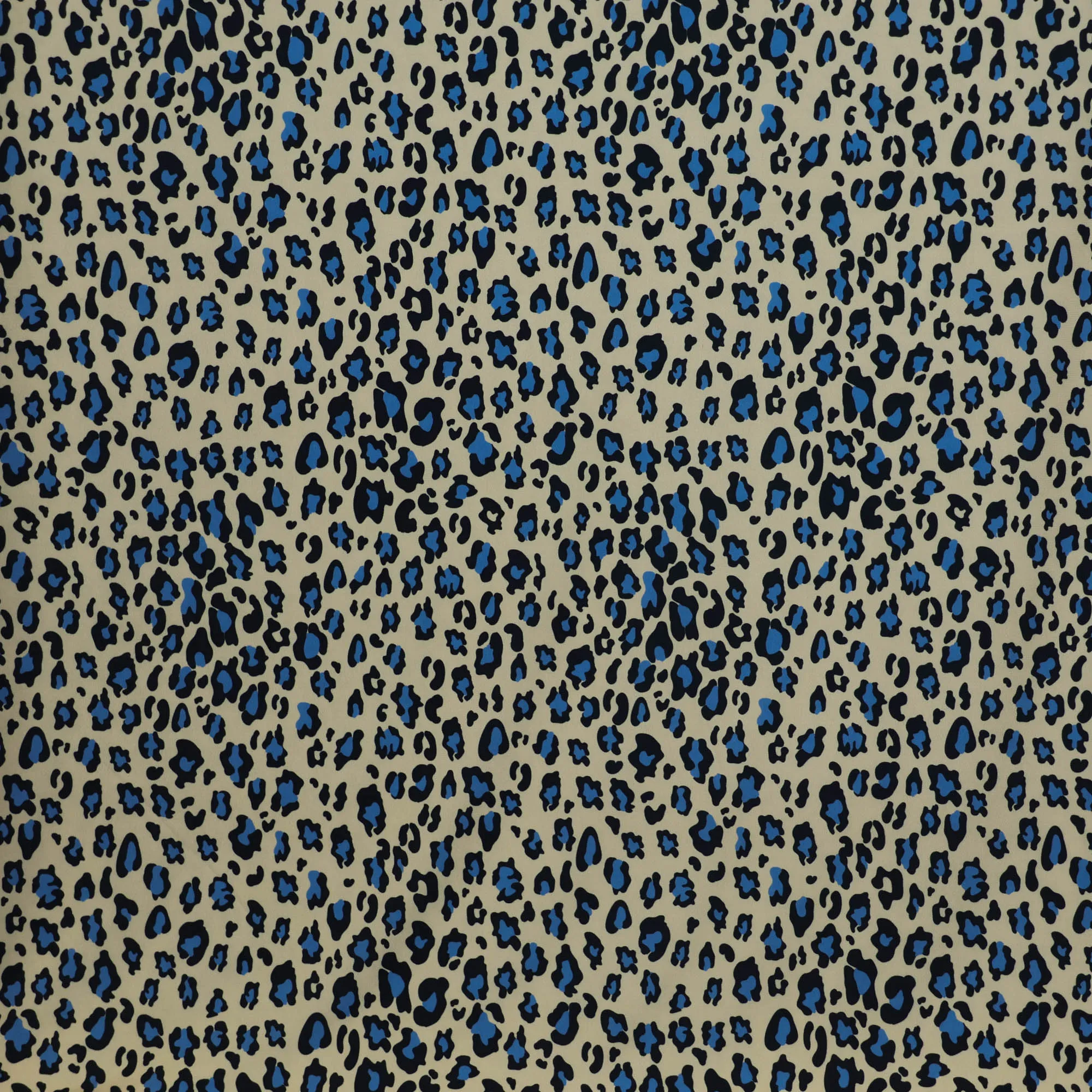 Tricot beige met blauwe luipaardprint