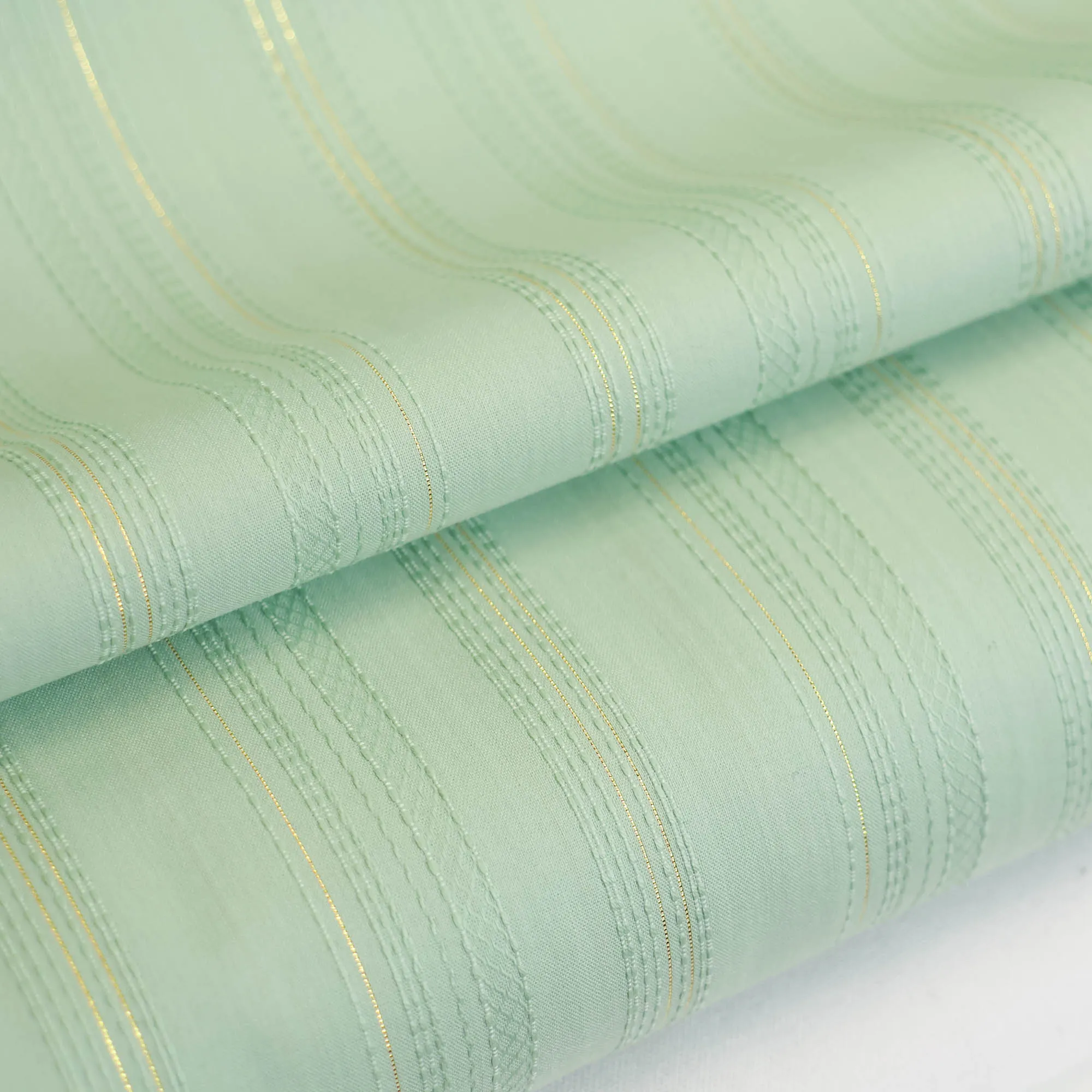 Katoen broderie gestreept met gouddraad