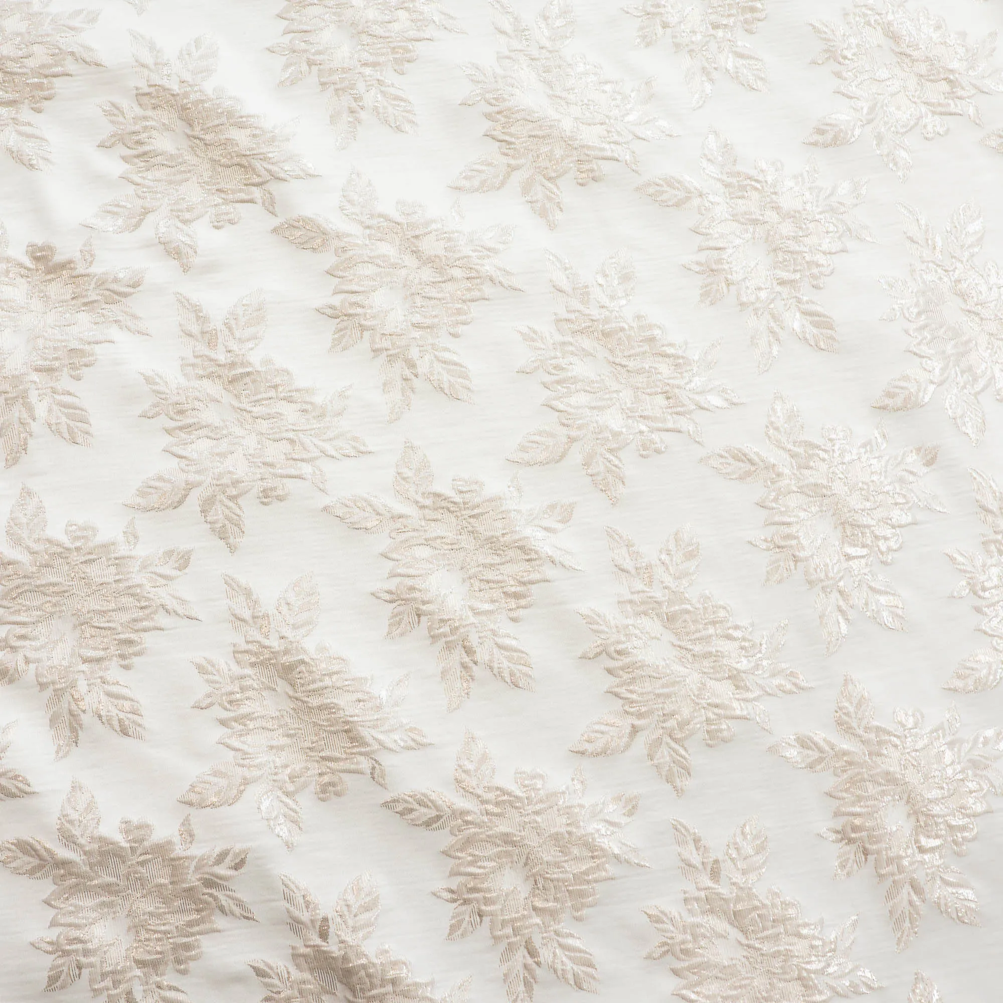 Jacquard ecru met glanzende bloemen