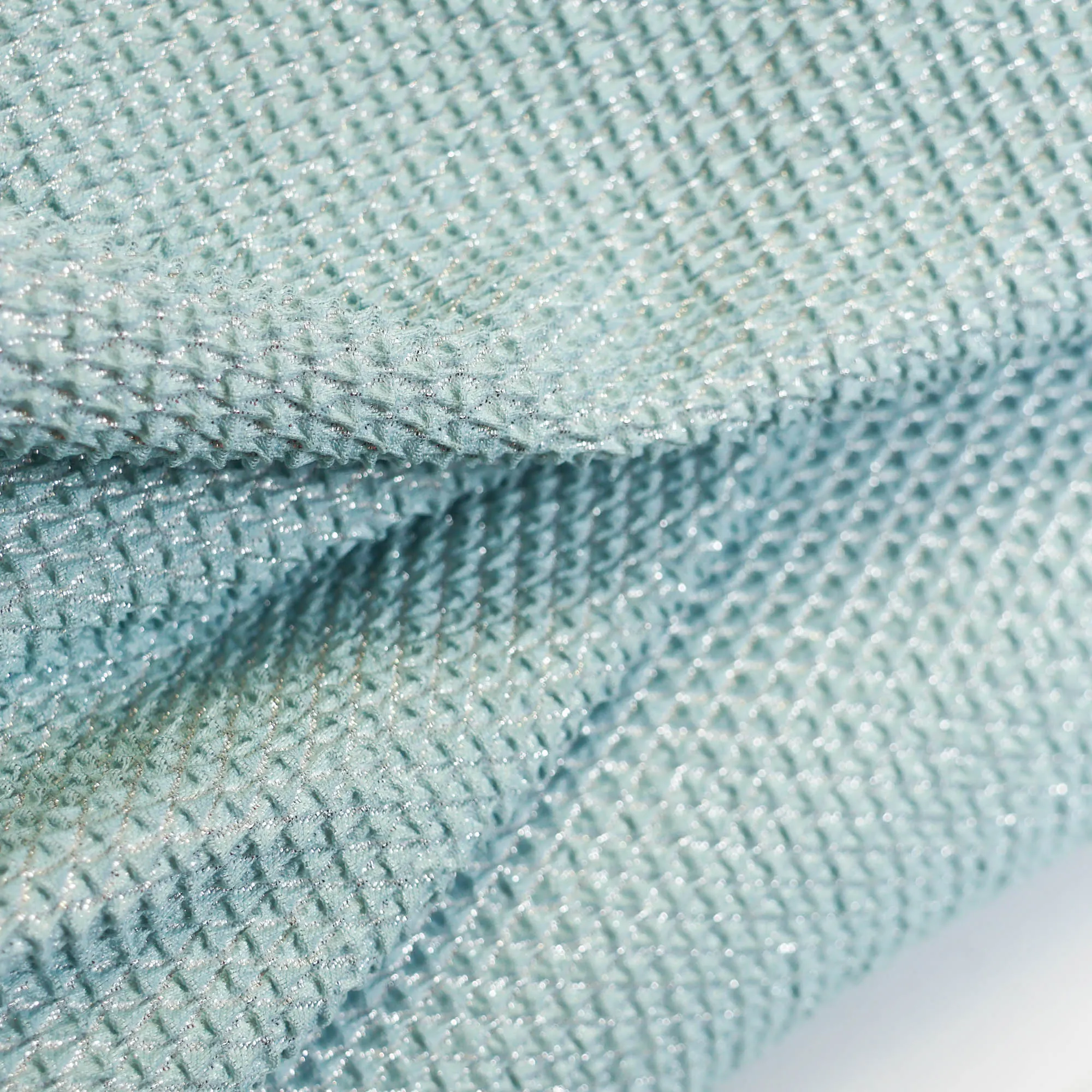 Polyester reliëfstof lichtblauw met zilver metaaldraad