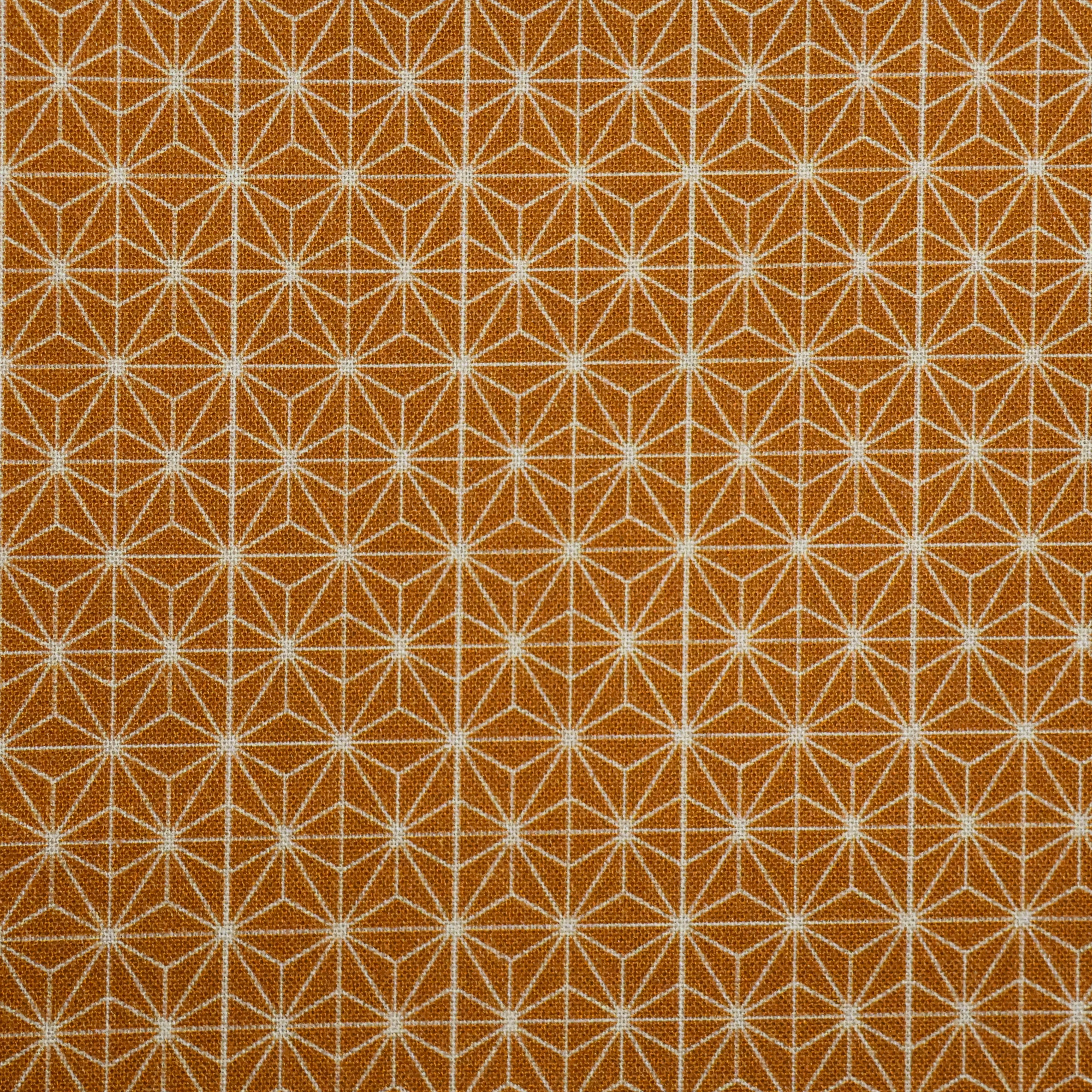 Katoen goud met abstract motief