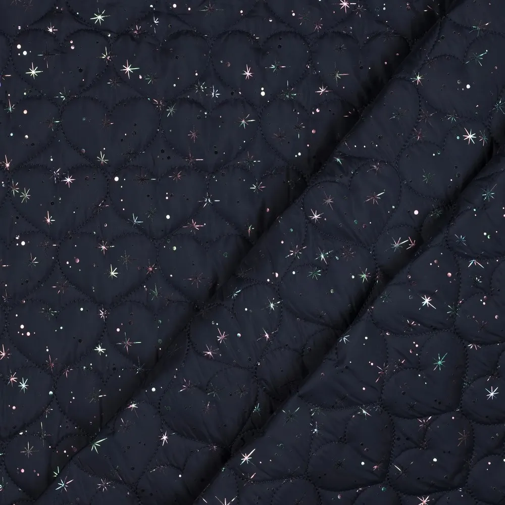 Matelassé blauw met glitterhartjes