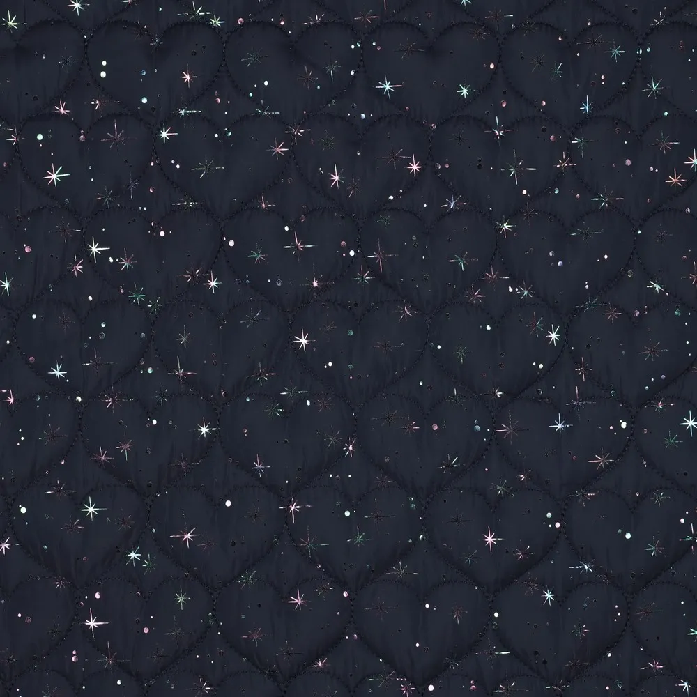 Matelassé blauw met glitterhartjes