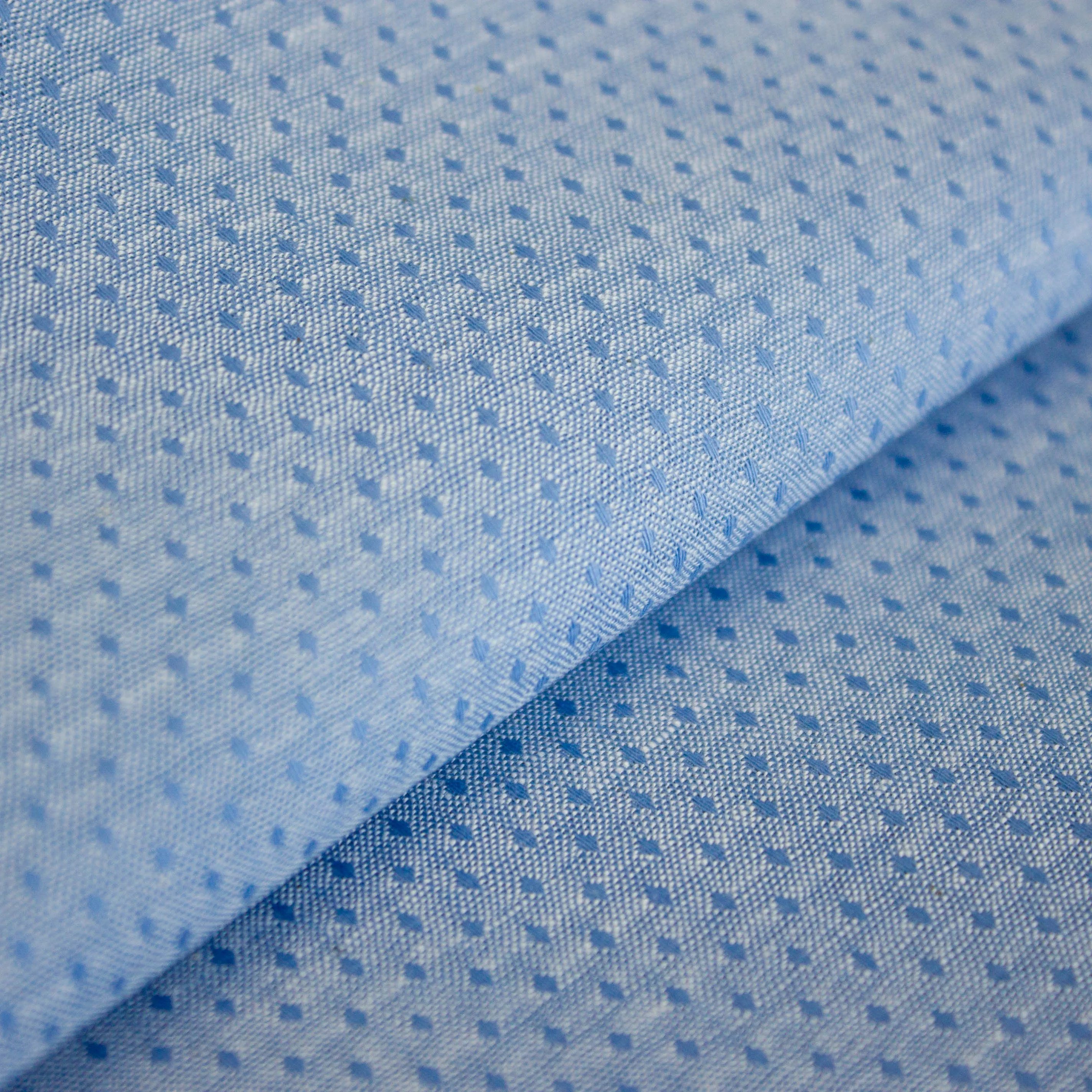 Katoen polyester blauw met fijne bolletjes