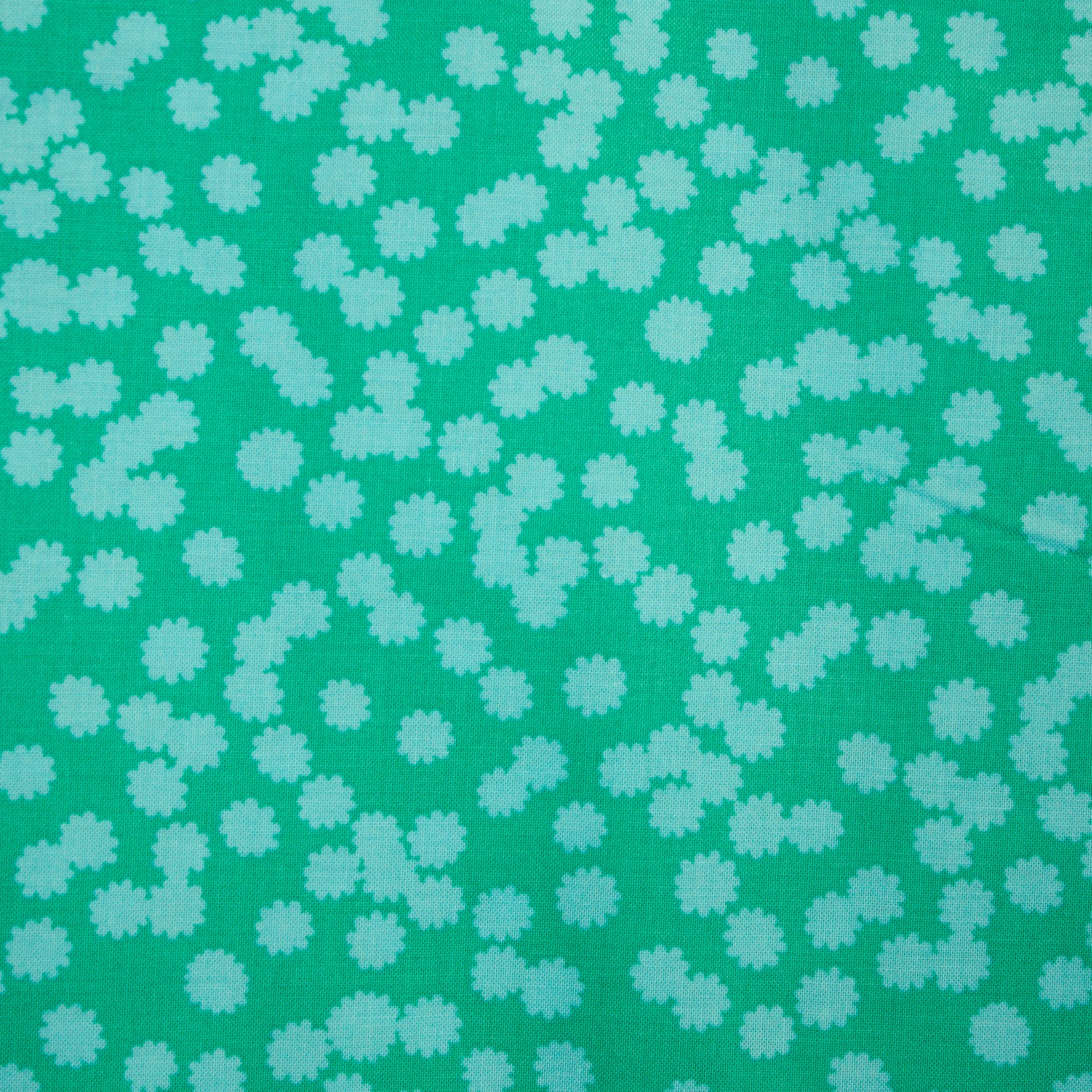 Katoen turquoise met lichtblauwe bloemen