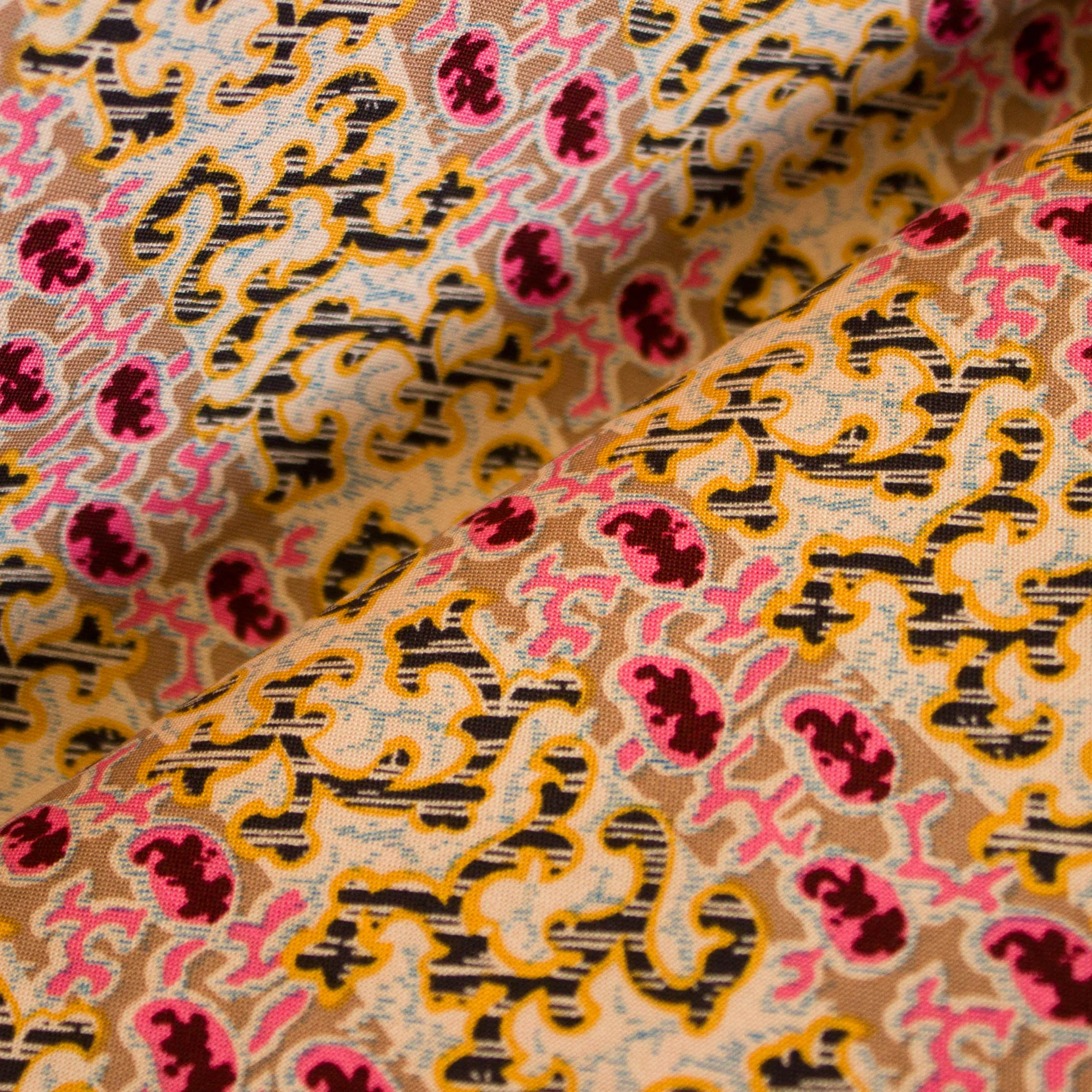 Katoen met abstracte bruine/roze paisley print
