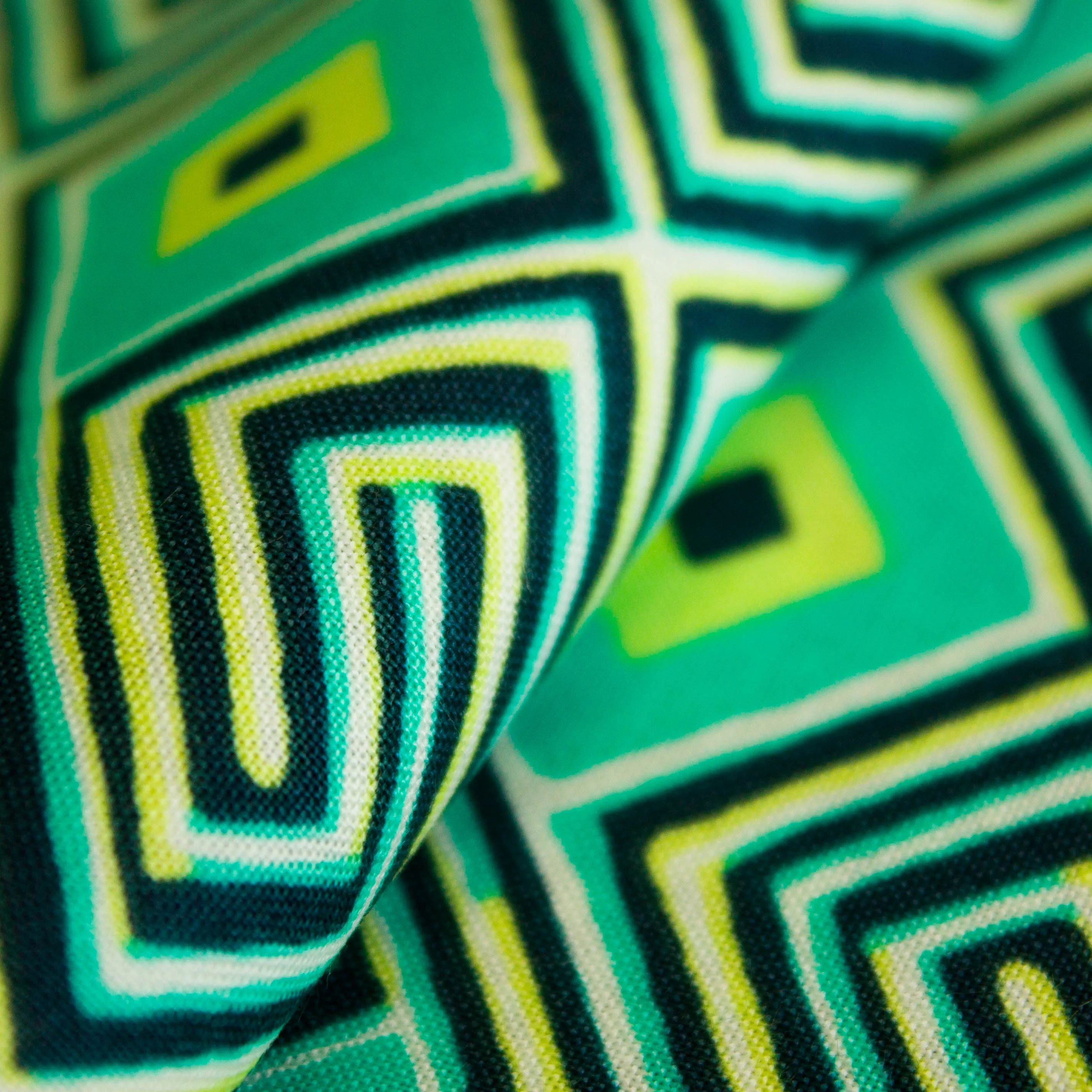 Katoen groen met abstract motief