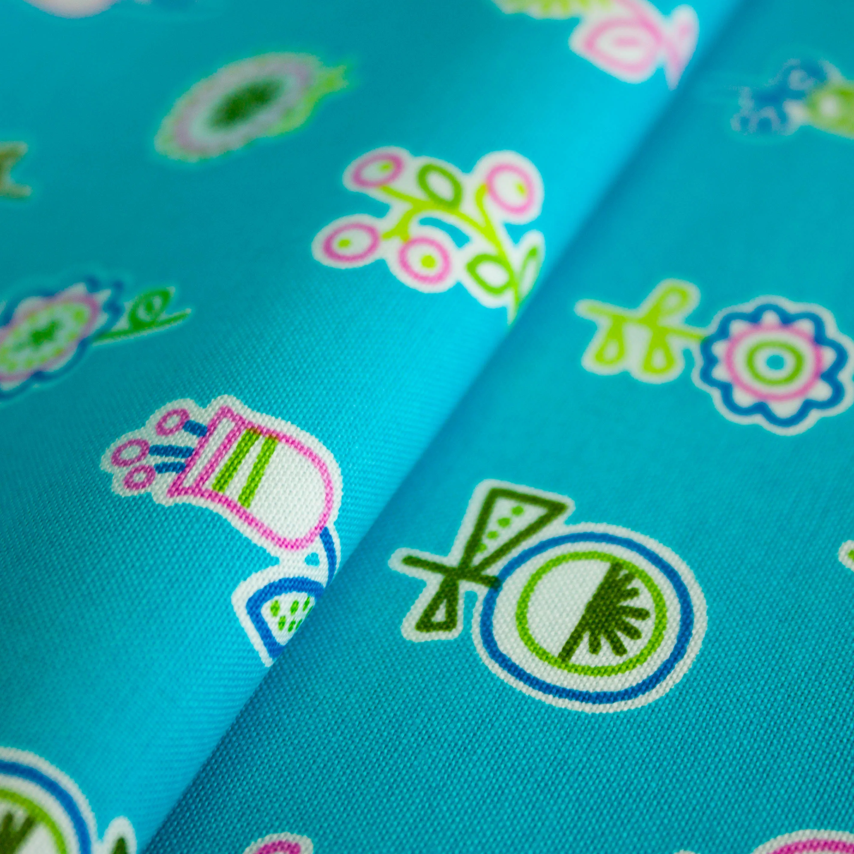 Katoen turquoise met bloemen