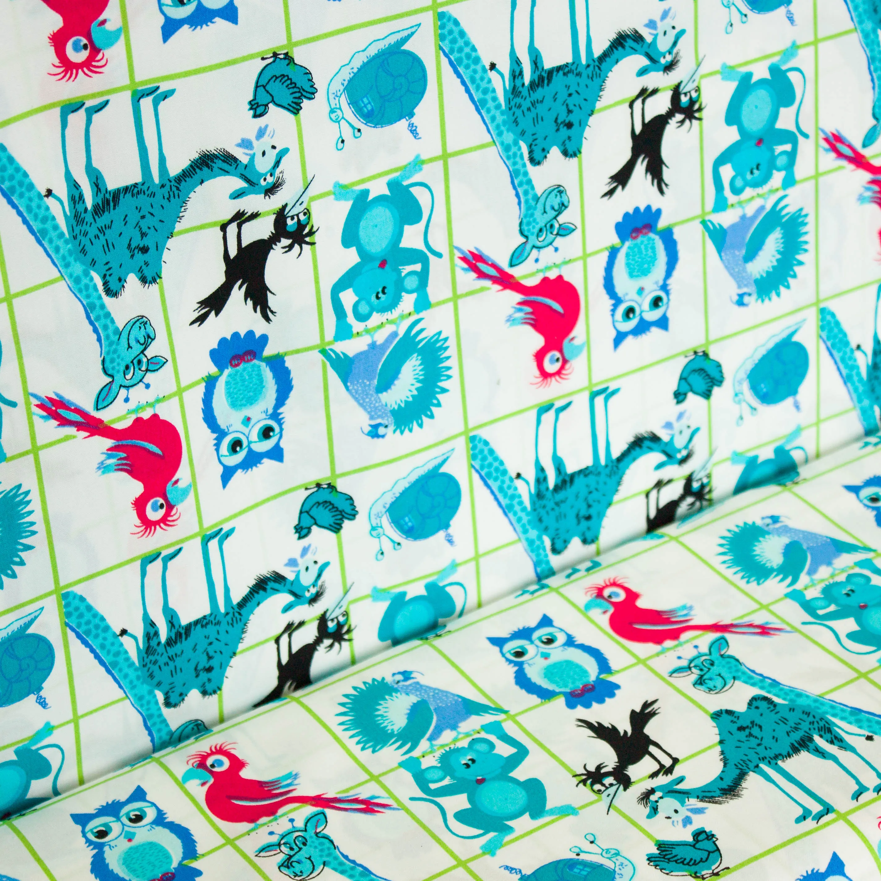 Katoen wit met turquoise dieren