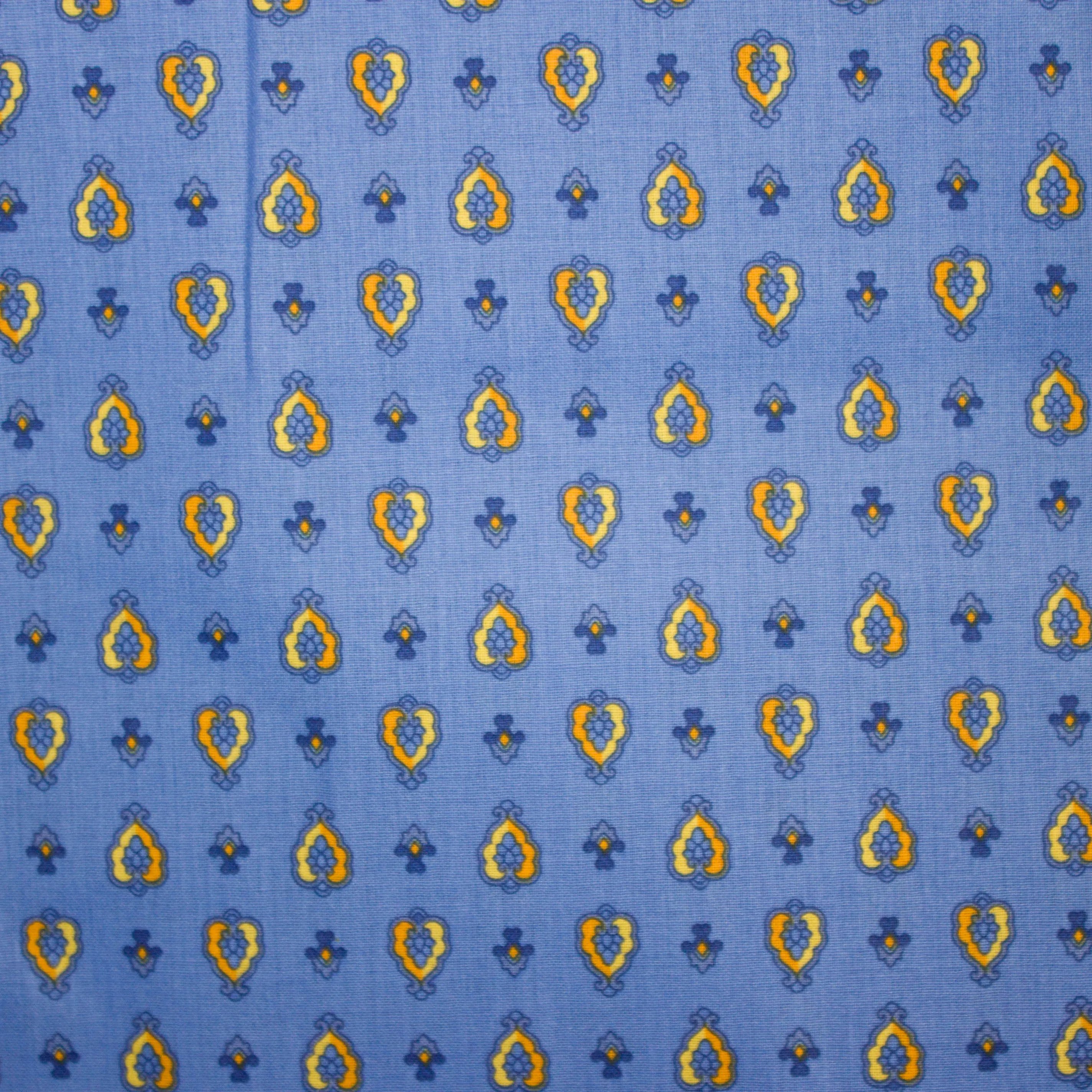 Katoen blauw met geel ornament motief