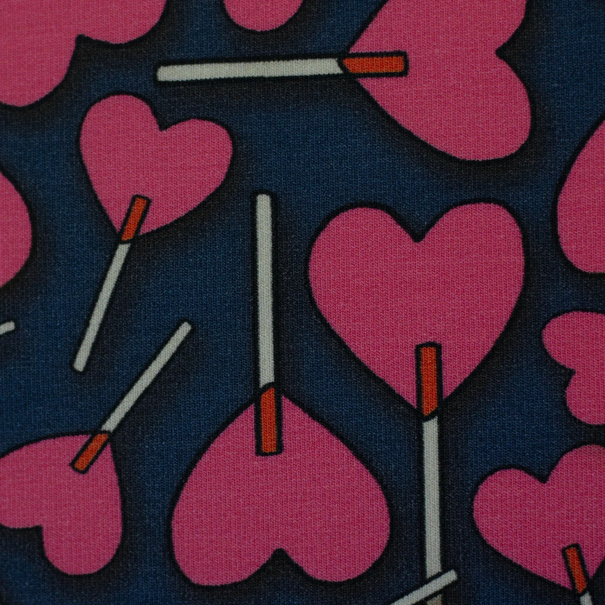 French terry donkerblauw met hartvormige lolly's