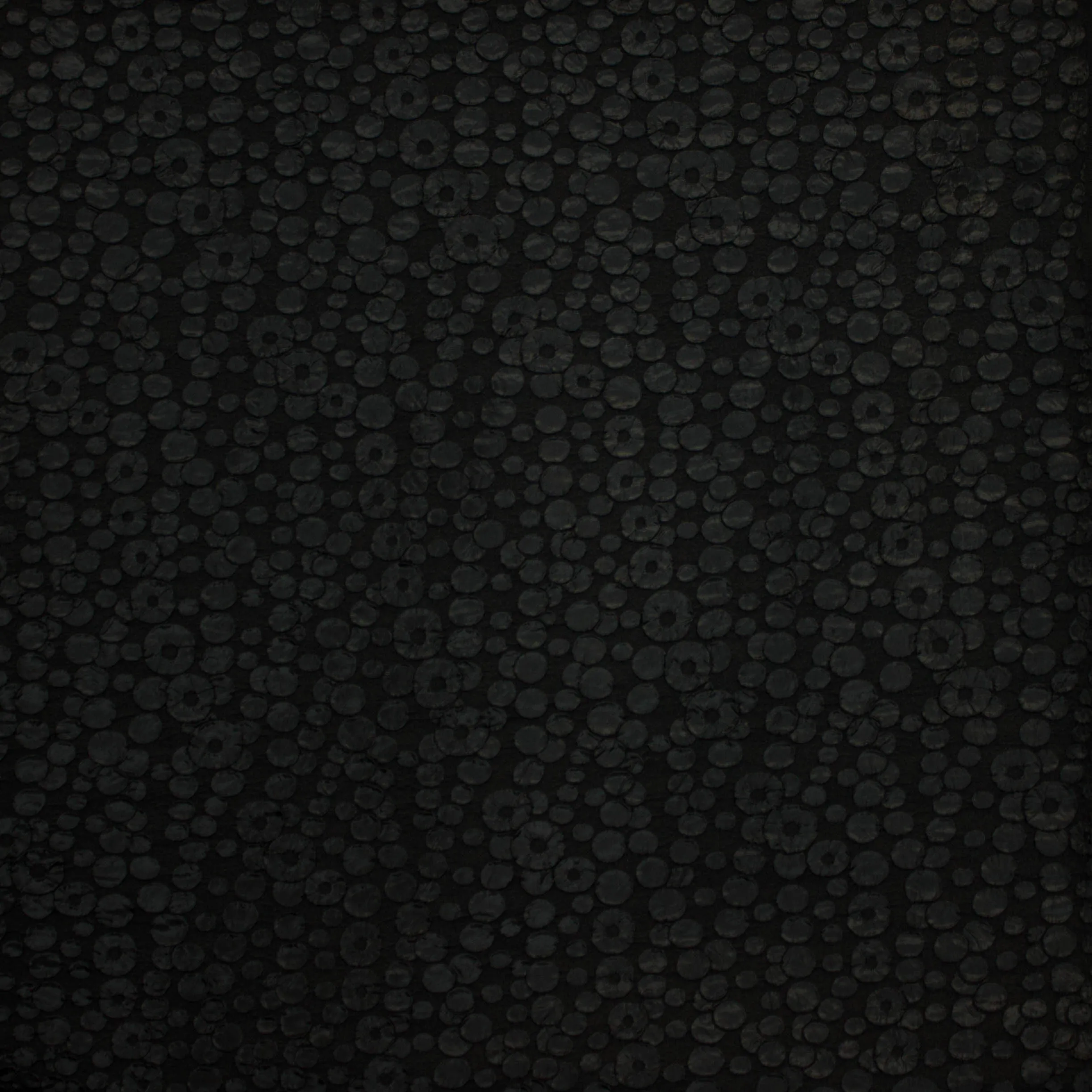 Jaquard polyester zwart met cirkels