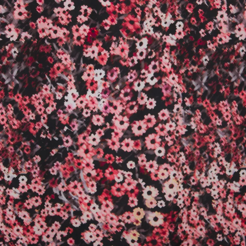 Tricot crêpe zwart met roze bloemmotief