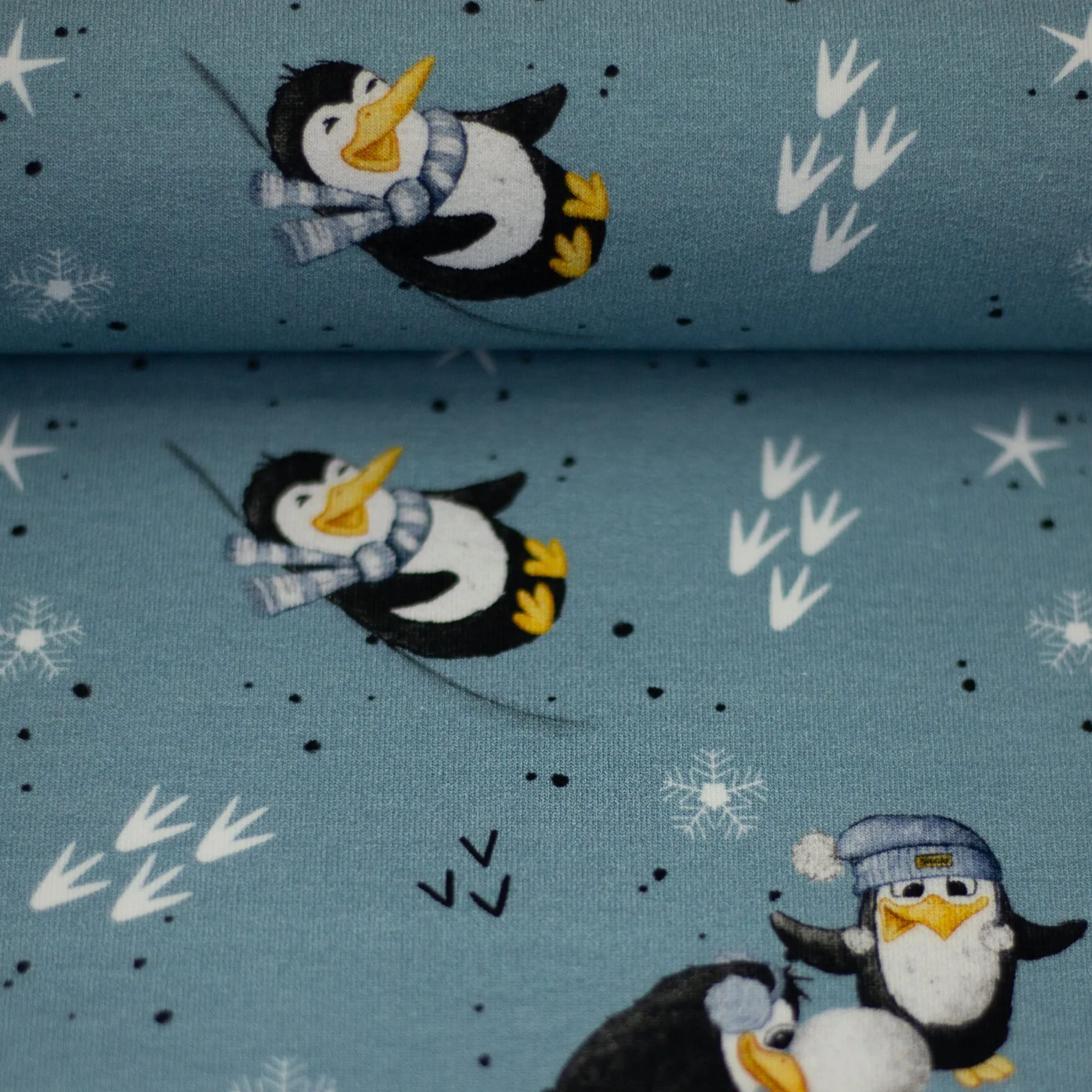 French terry blauw met pinguïns