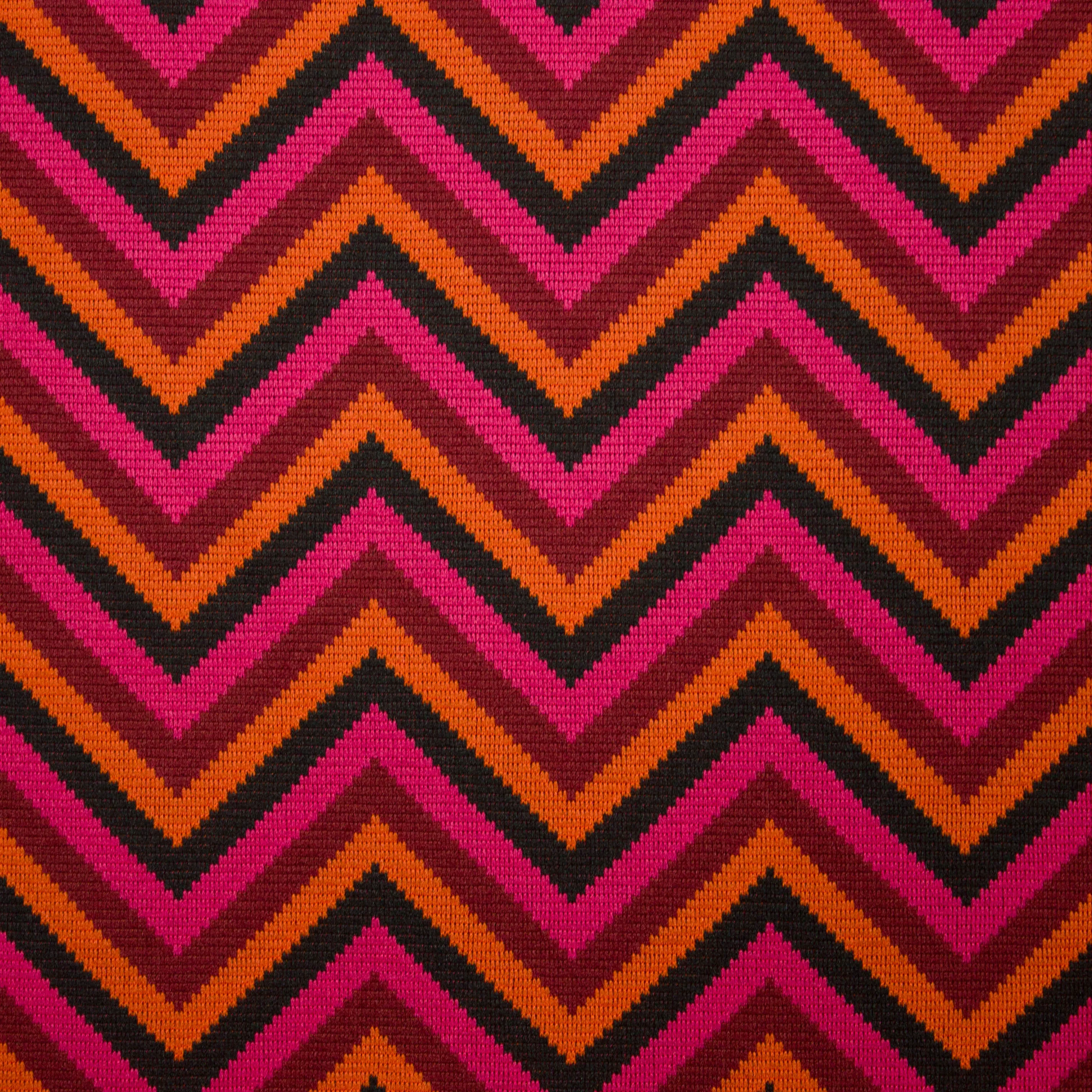 Stretch jacquard oranje / roze met zigzag motief