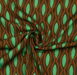 Viscose licht elastisch met een groen/bruin patroon