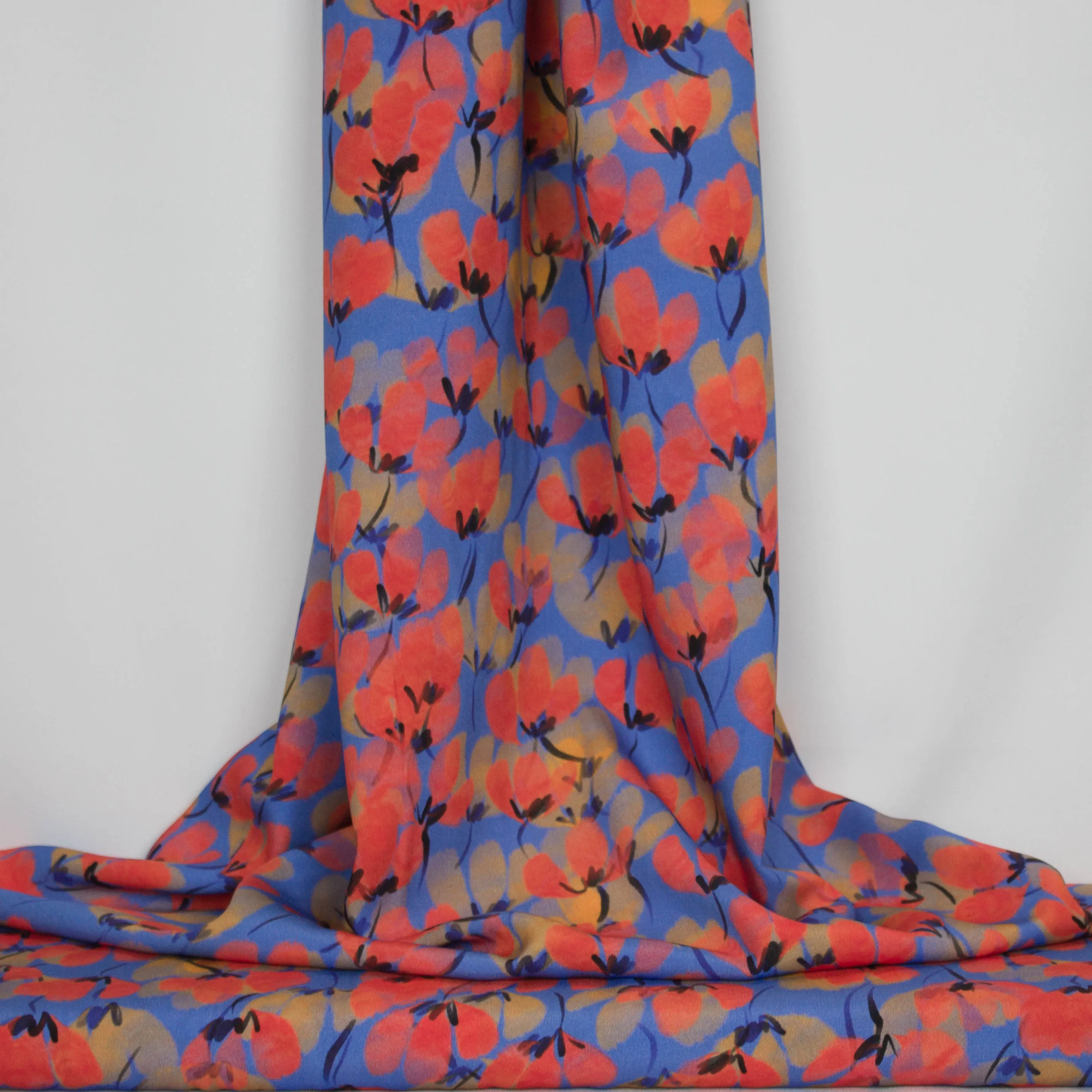Viscose blauw met oranje en gele bloemetjes