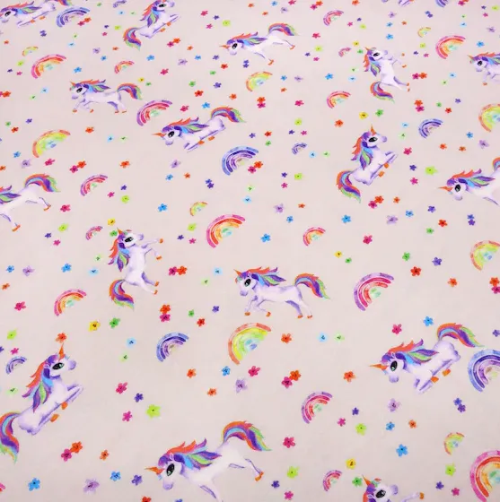Tricot lichtroze met eenhoorns en regenbogen