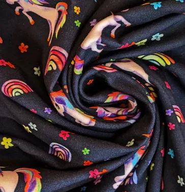 Tricot donkerblauw met eenhoorns en regenbogen