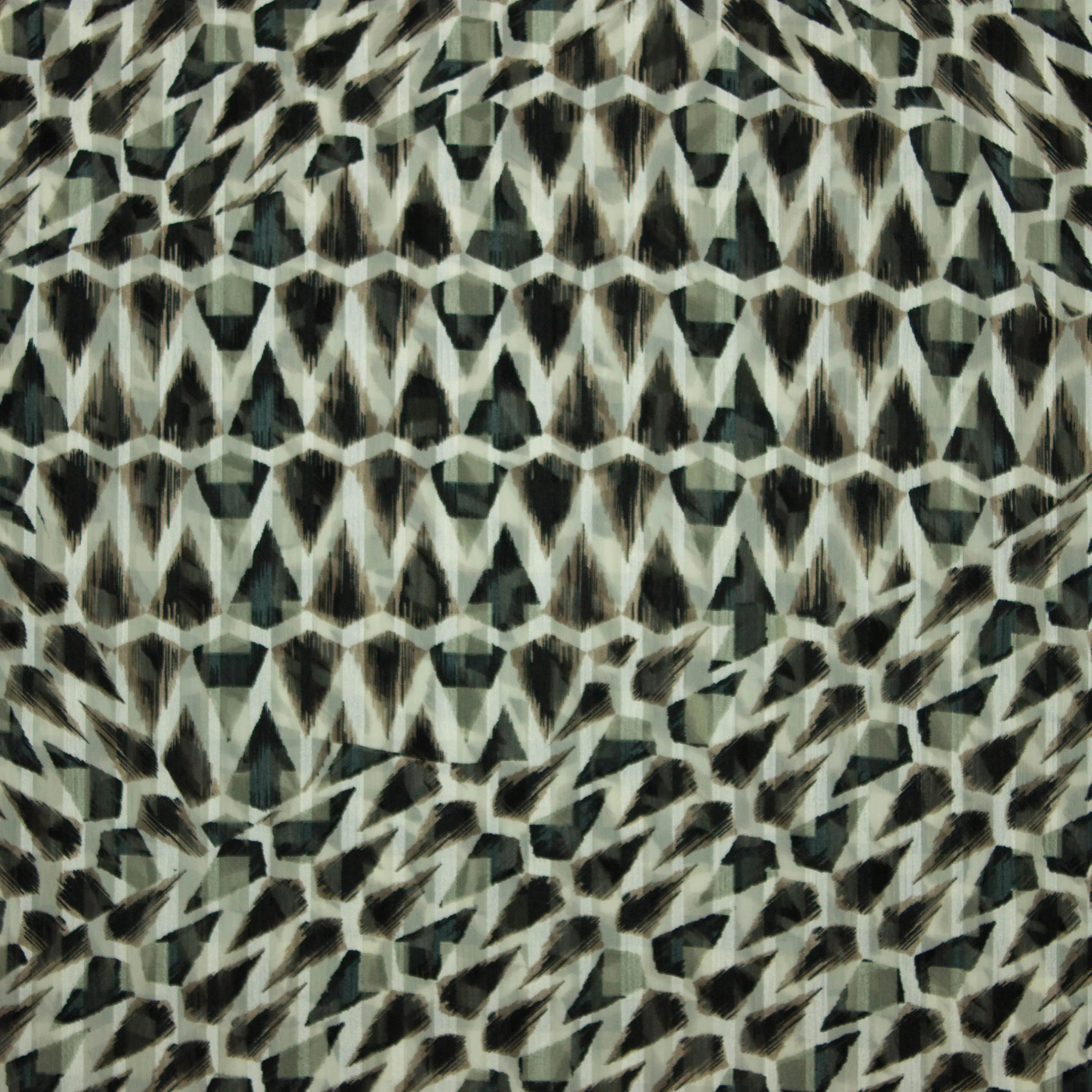 Voile met groene en zwarte figuren