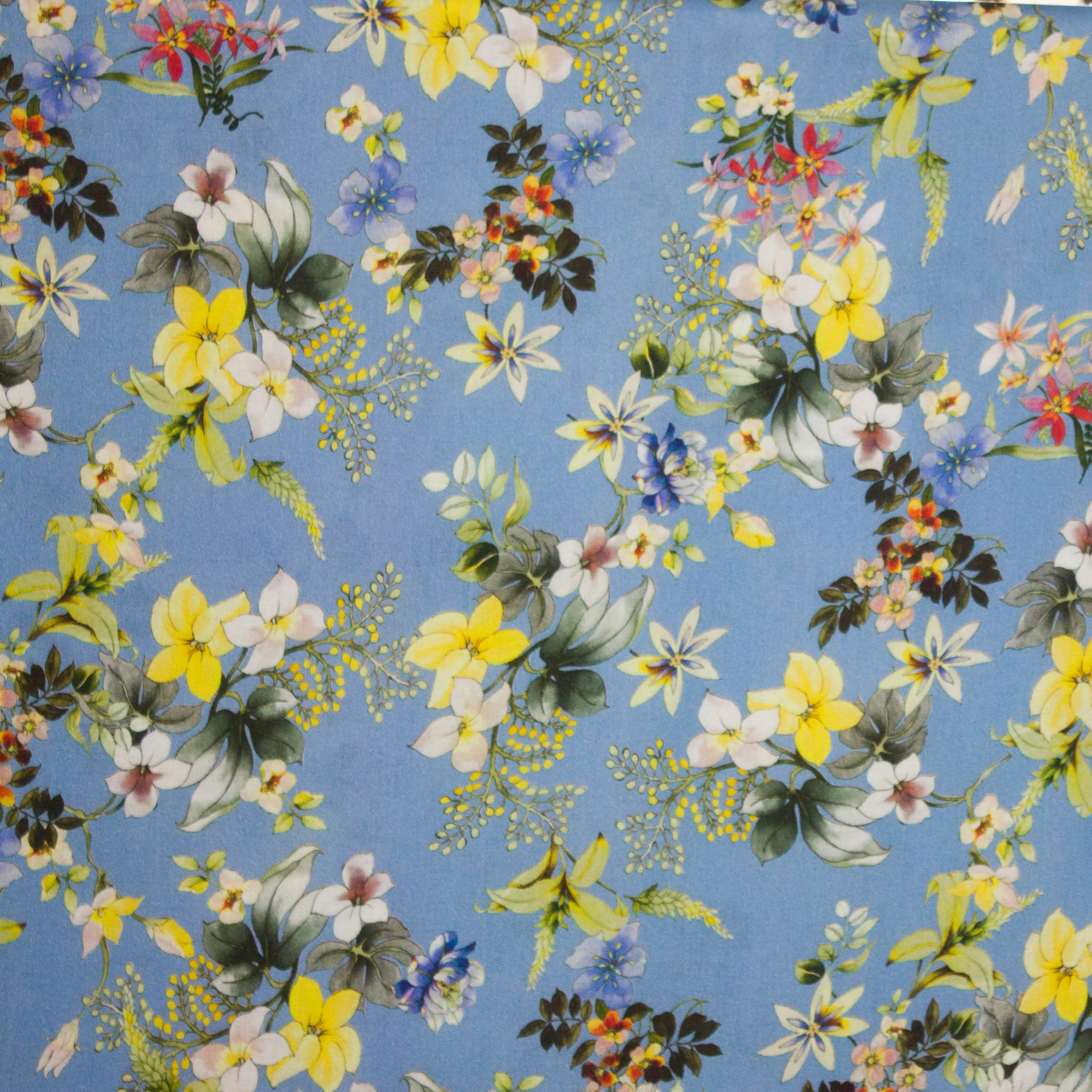 Crêpe viscose jeansblauw bloemen motief