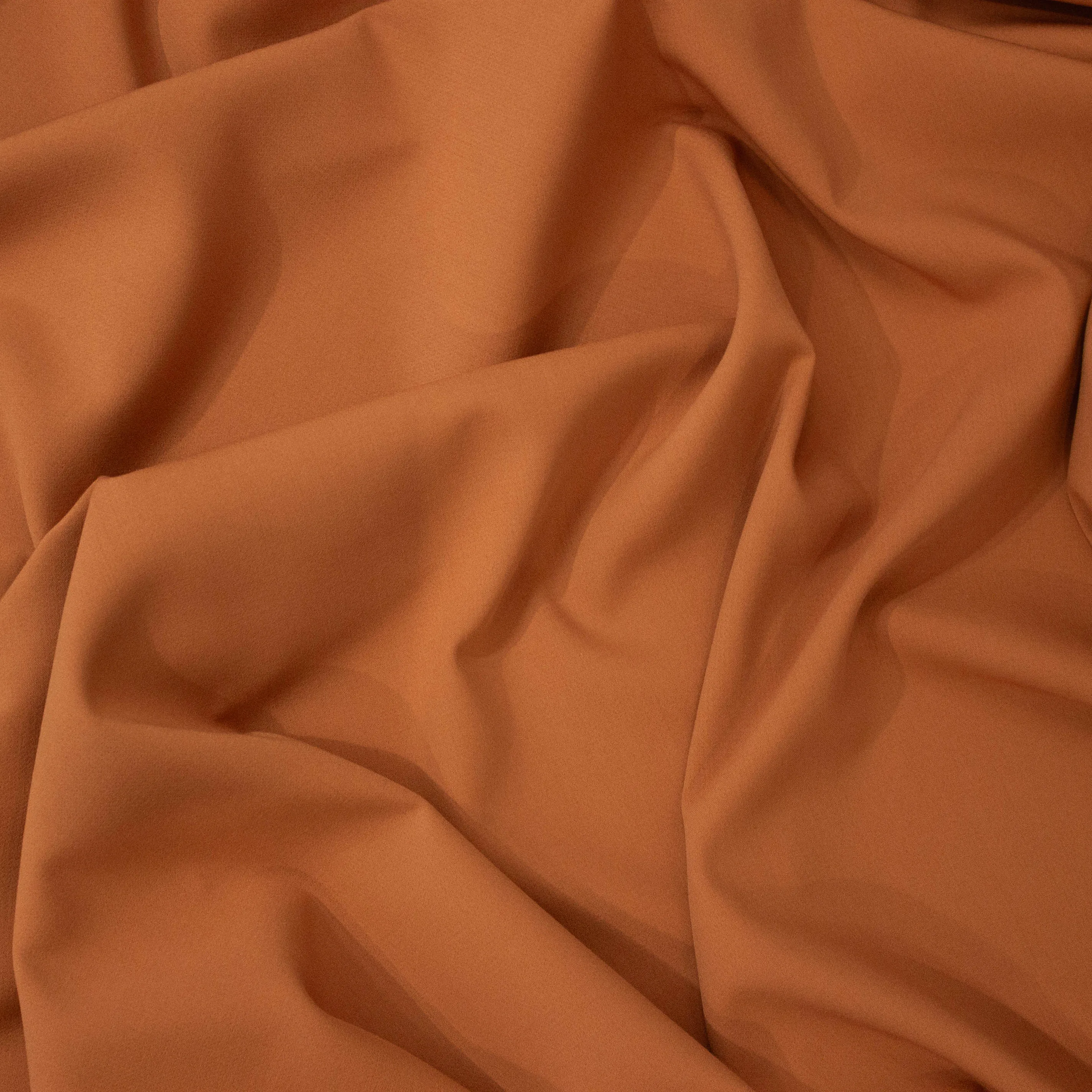 Crêpe stretch warm oranje beige   -  Lorré