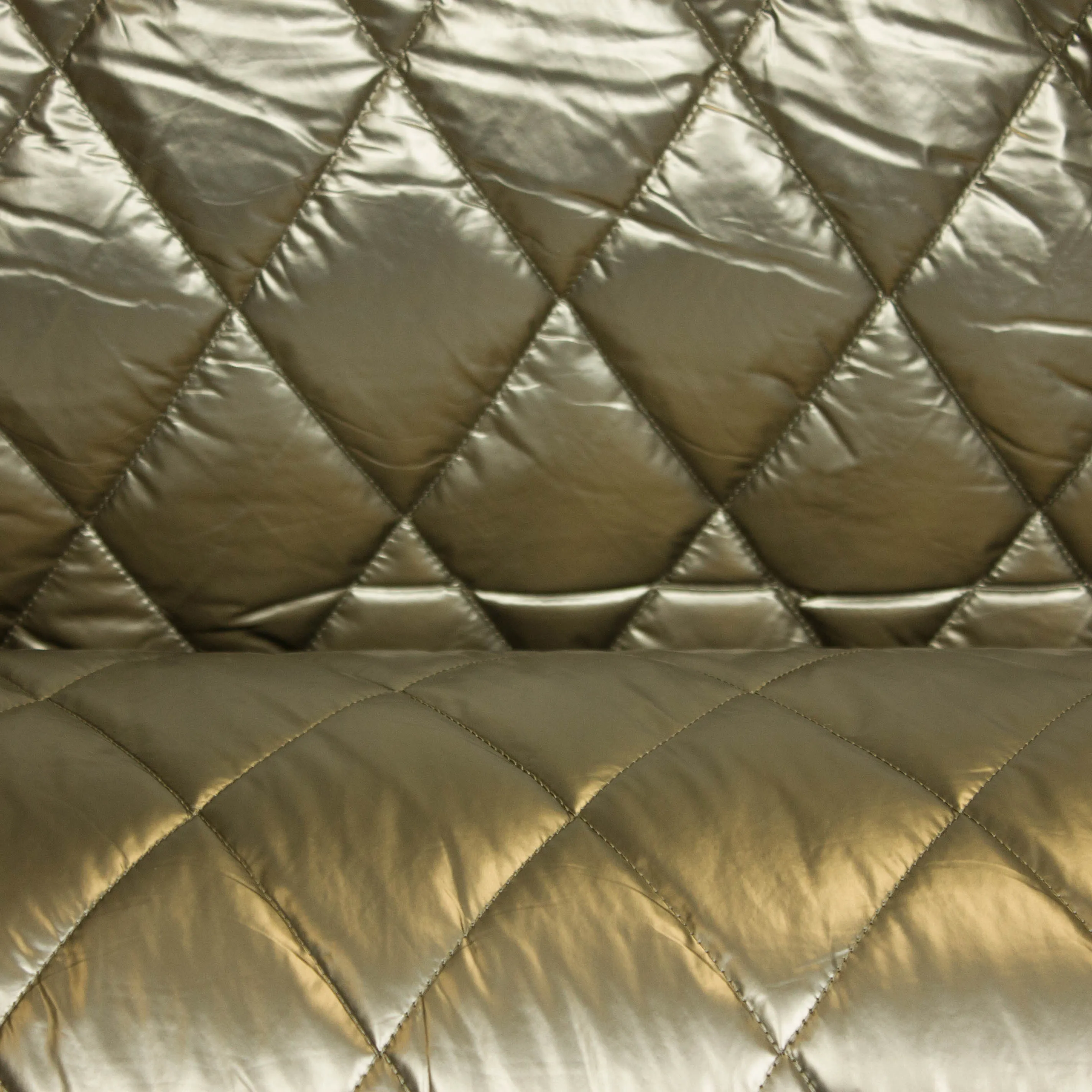 Gewatteerde polyester metallic stepper goud