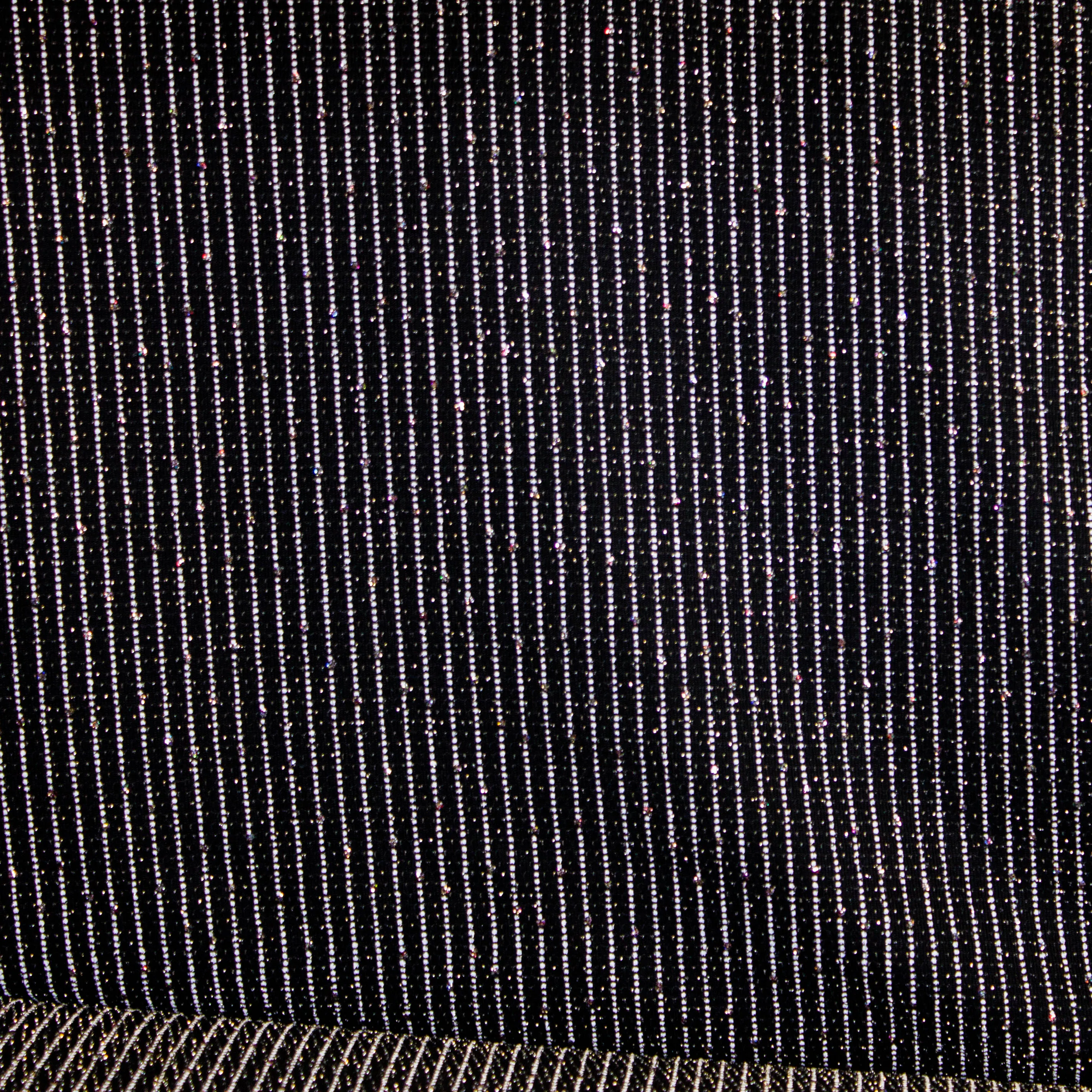 Glitter tricot licht vallend zwart