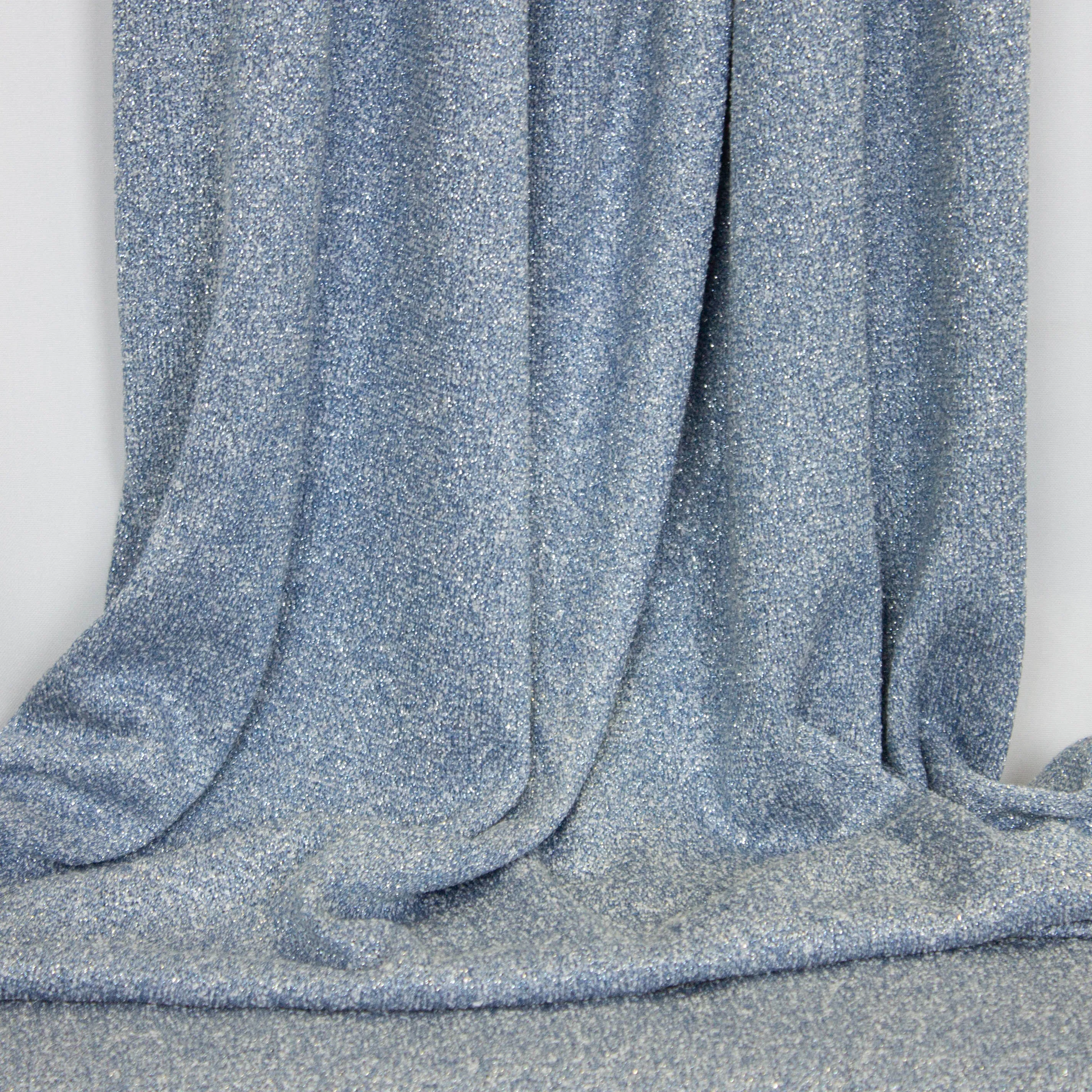 Tricot blauw met zilveren glinstering